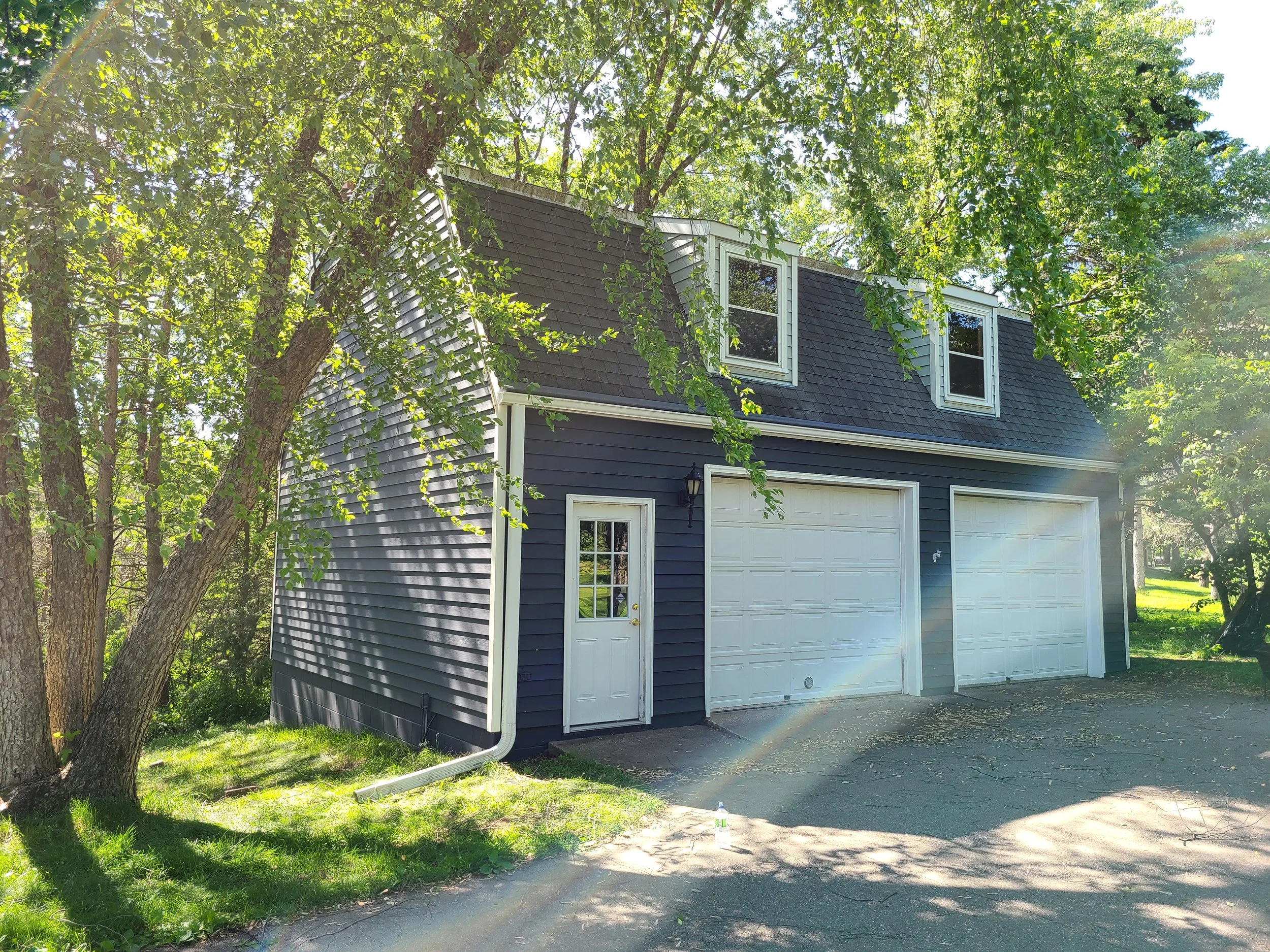 Fresh exterior paint on a detached garage in Afton, MN