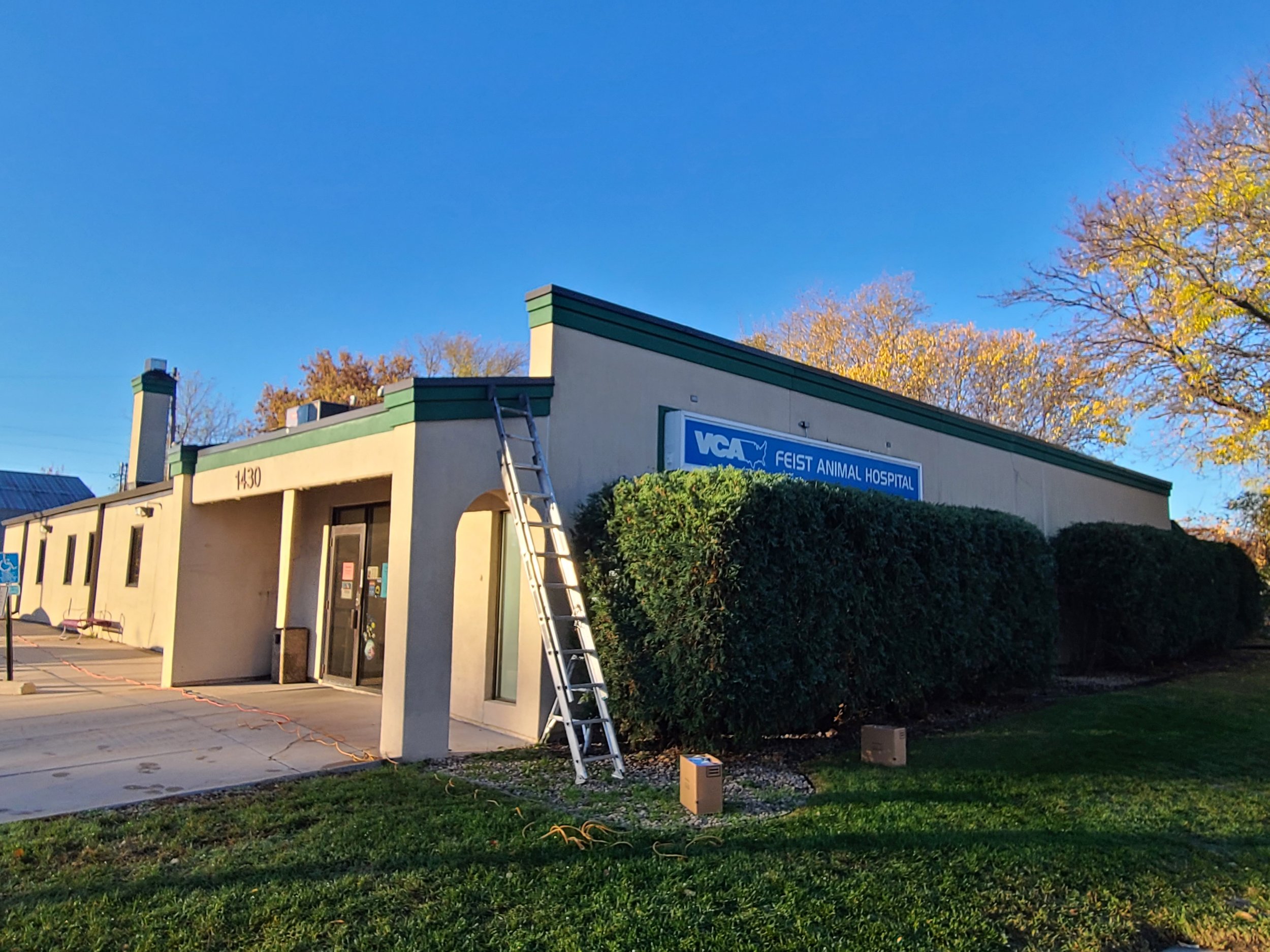 VCA Feist Animal Hospital prior to exterior repaint, with aging surfaces and faded exterior finishes.