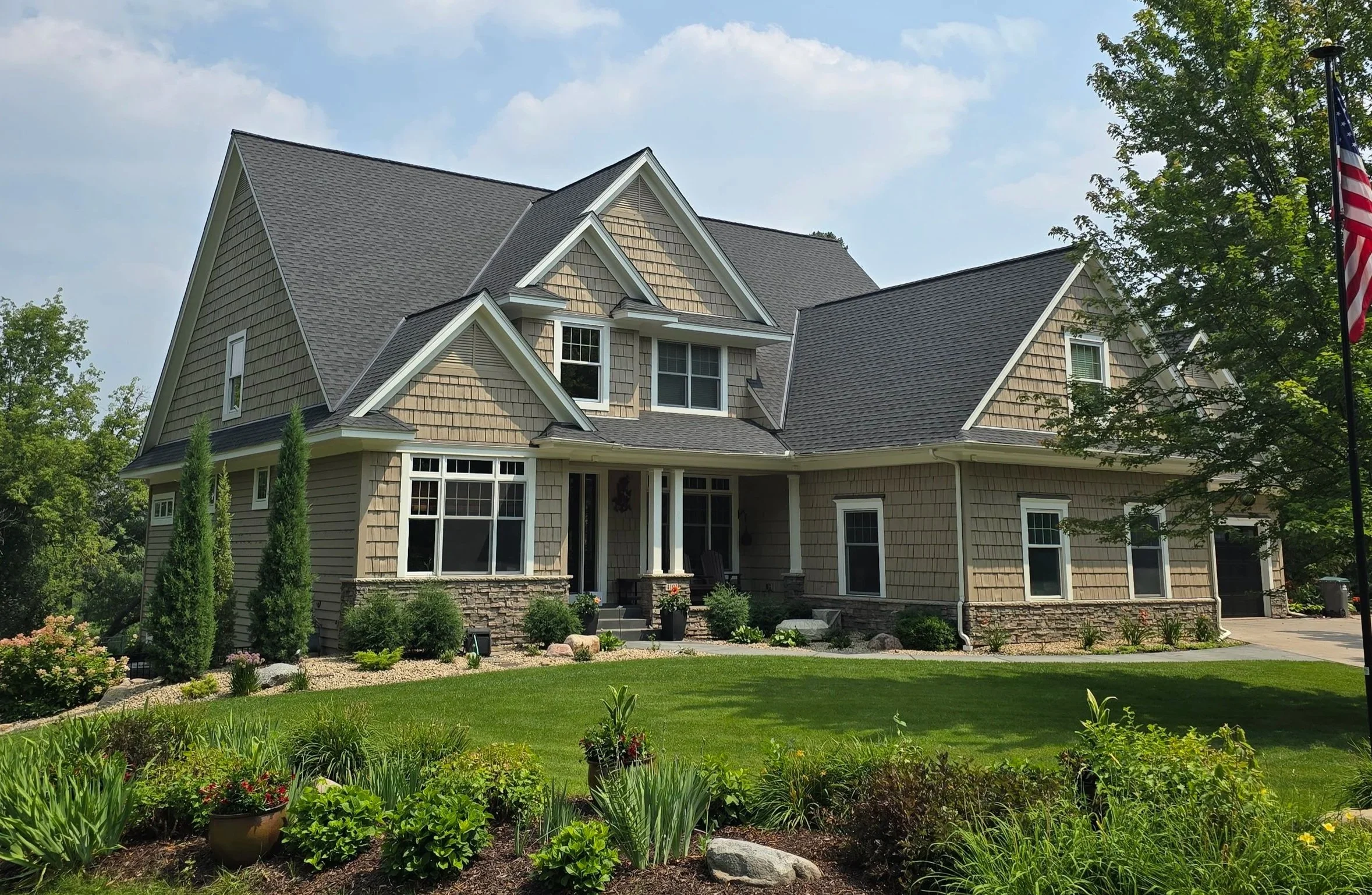 Custom cedar shake home exterior painted in Minnetonka, MN near Lake Minnetonka by Twin Cities exterior house painters Best House Painters.