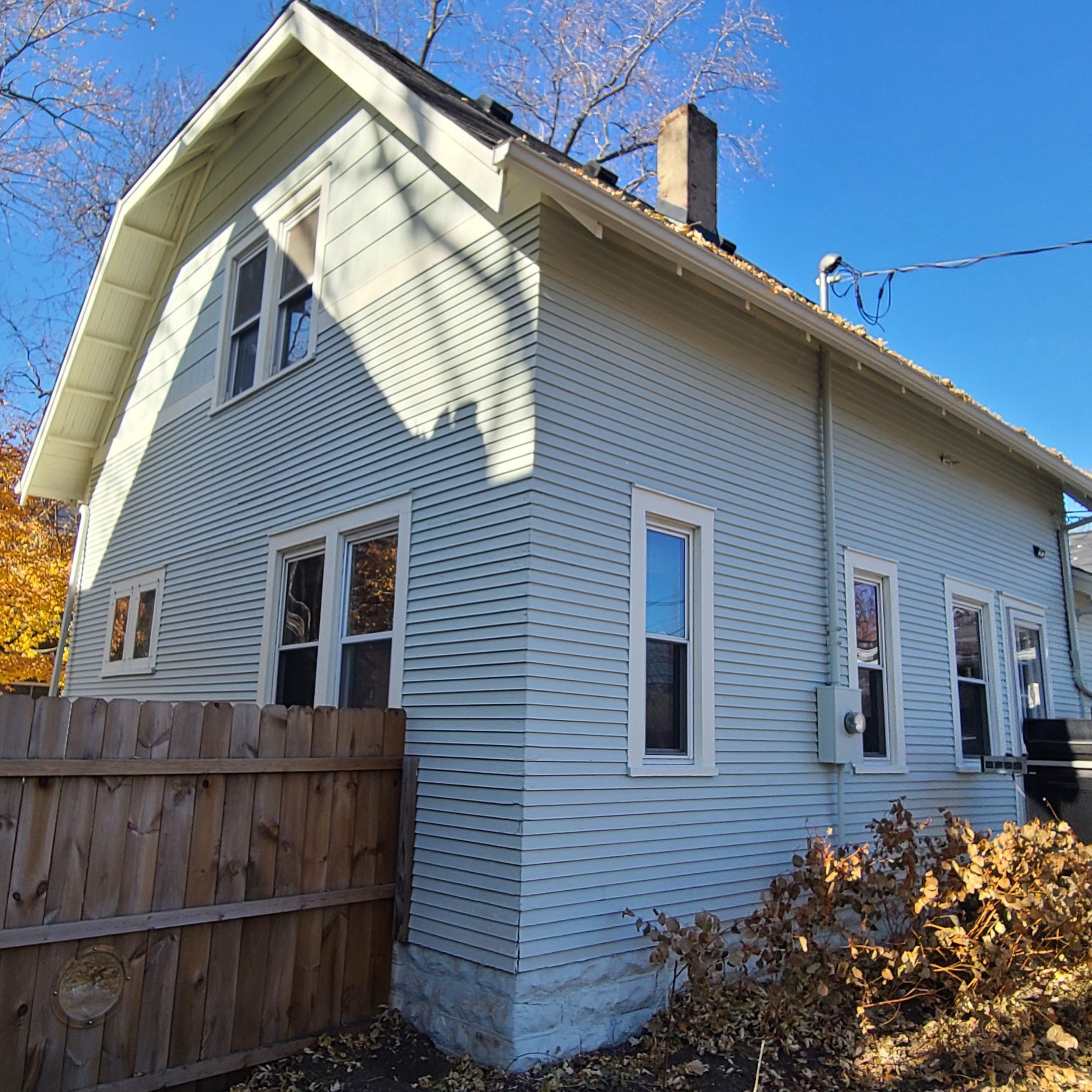 Formerly dark blue to this airy and light exterior scheme in Minneapolis’ Longfellow neighborhood