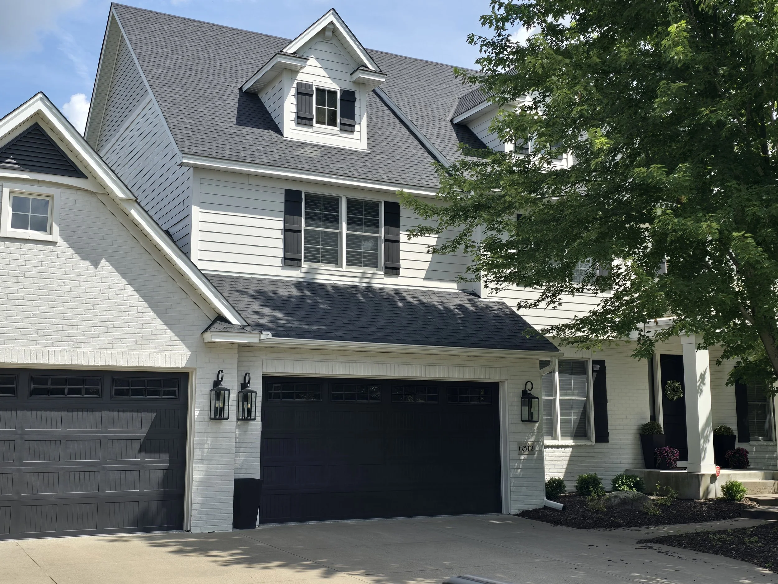 edina-white-modern-exterior-house-painting-black-garage.jpg
