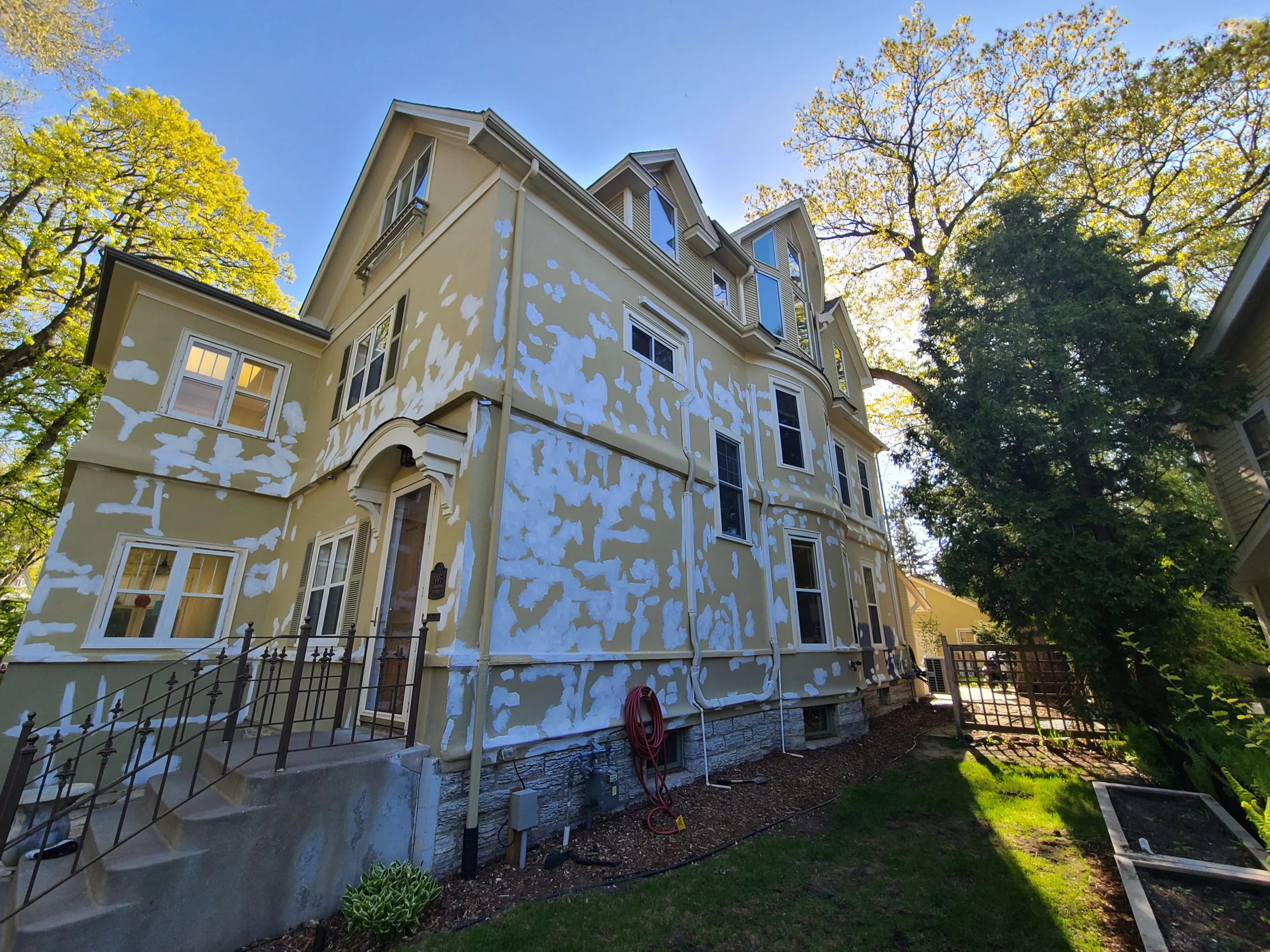 exterior-paint-prep-scraping-priming-historic-home.jpg
