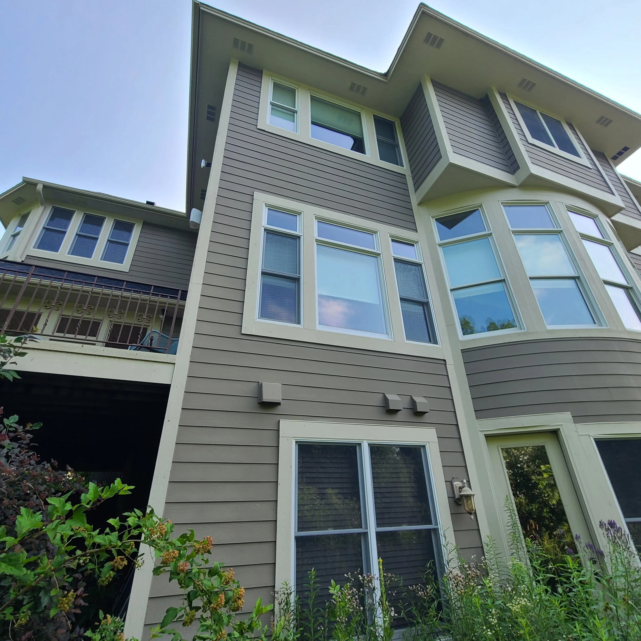 Detailed exterior repaint with crisp trim lines on a well-kept Eagan property