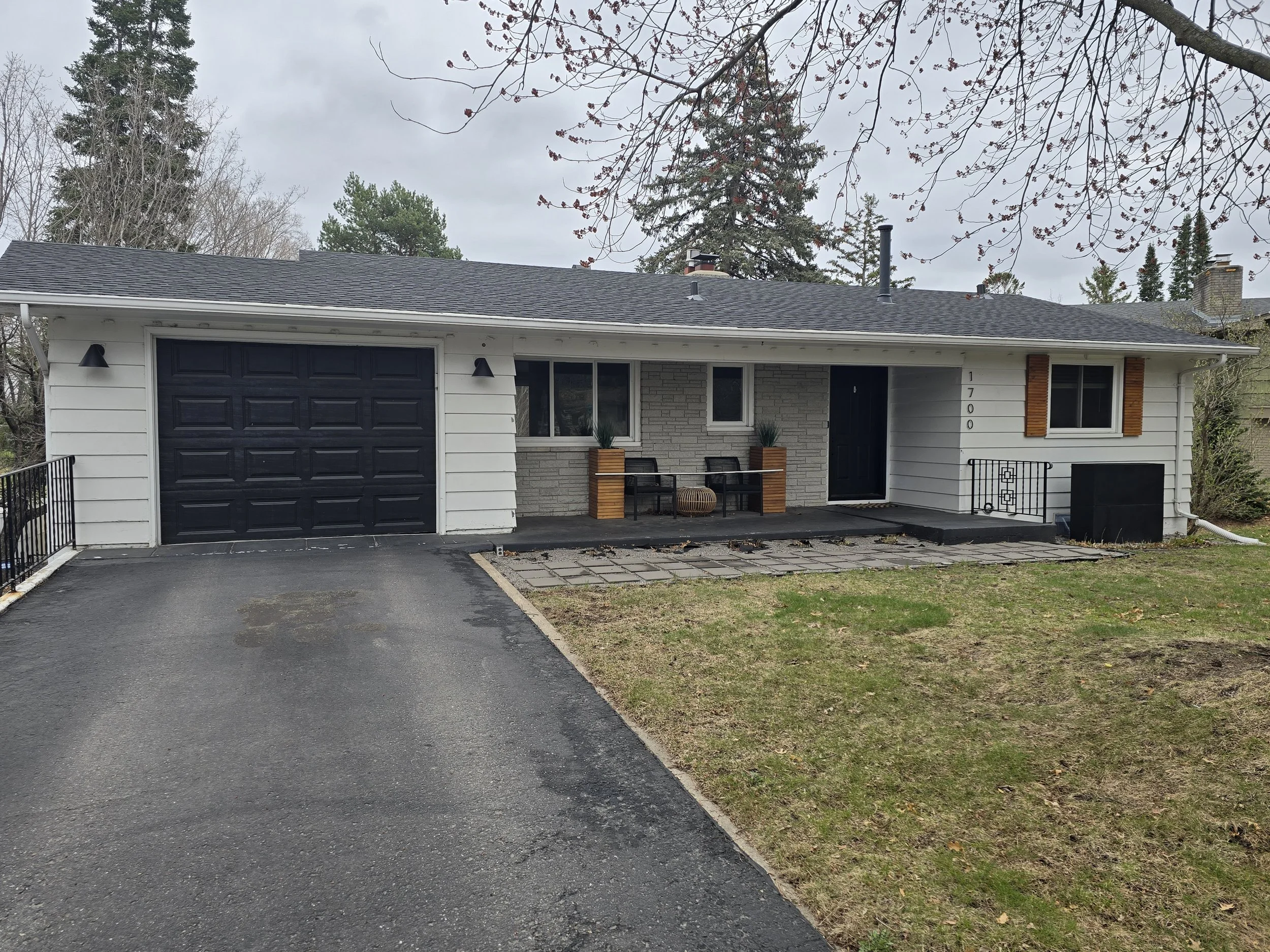 Clean exterior repaint on this mid-century Edina ranch
