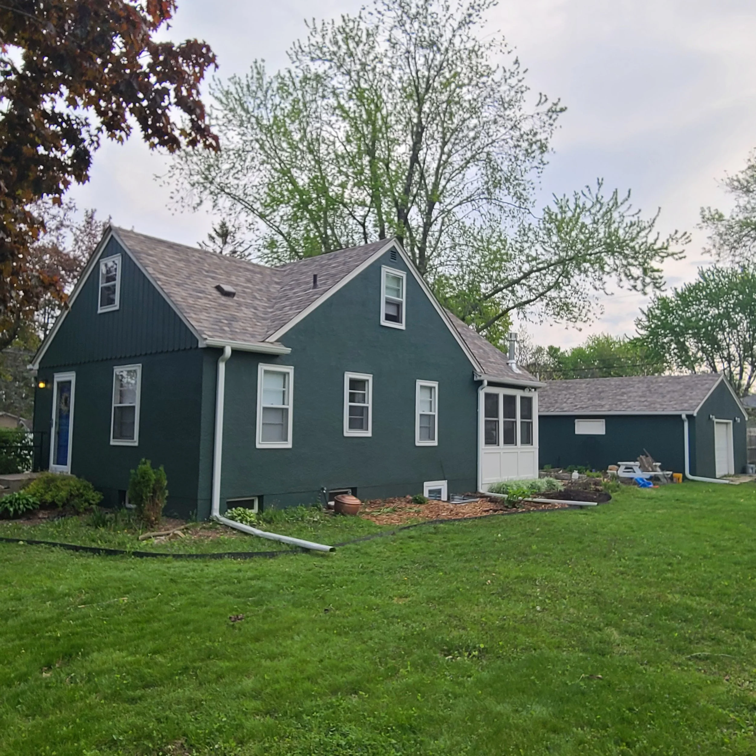 dark-green-exterior-repaint-minneapolis.jpg