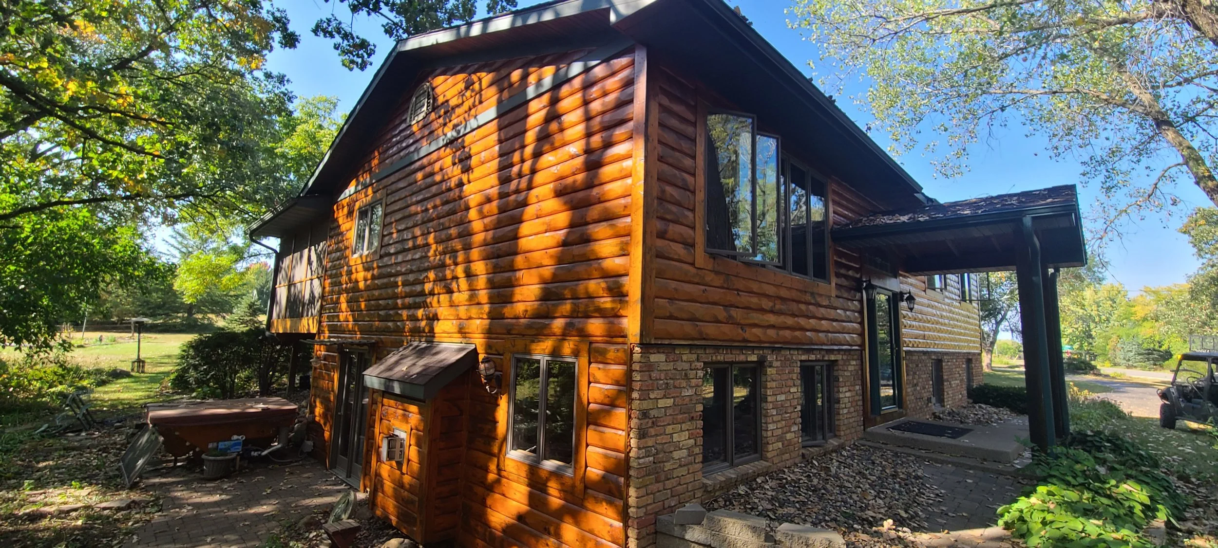 Full exterior refresh on a log cabin near Bald Eagle Lake