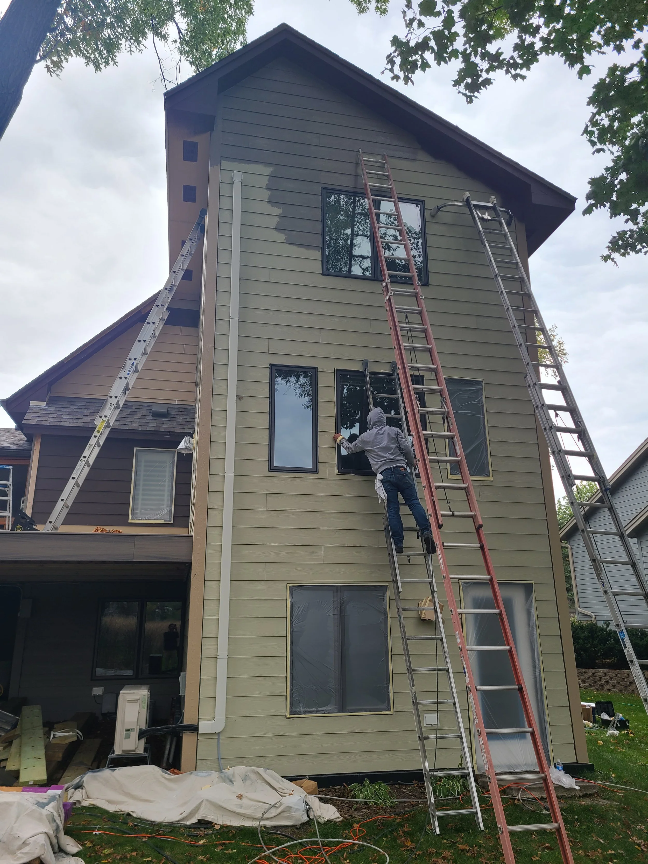 Detailed prep and priming on a multi-story White Bear Lake home.