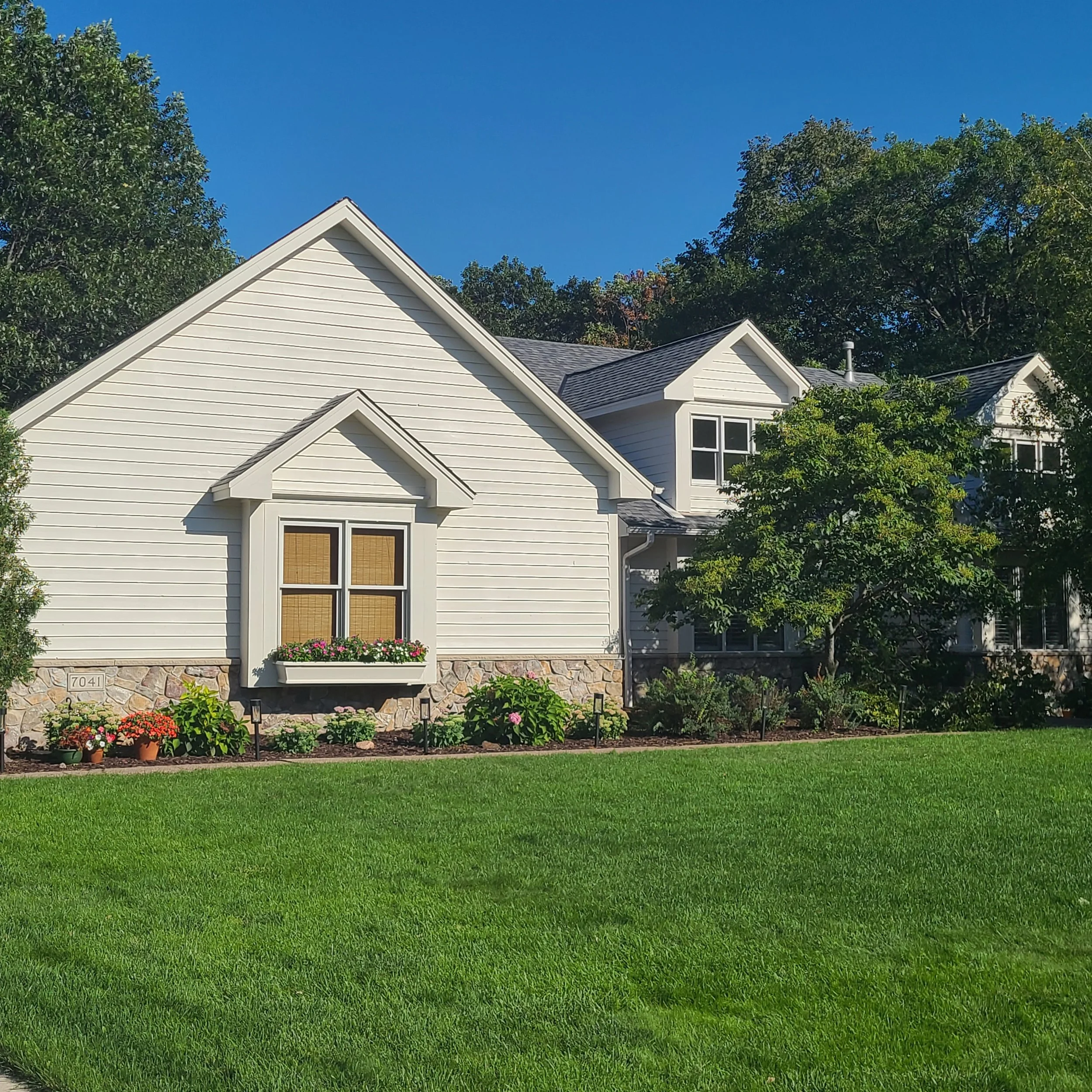 Fresh siding and crisp trim bring a bright, clean finish to this Edina home