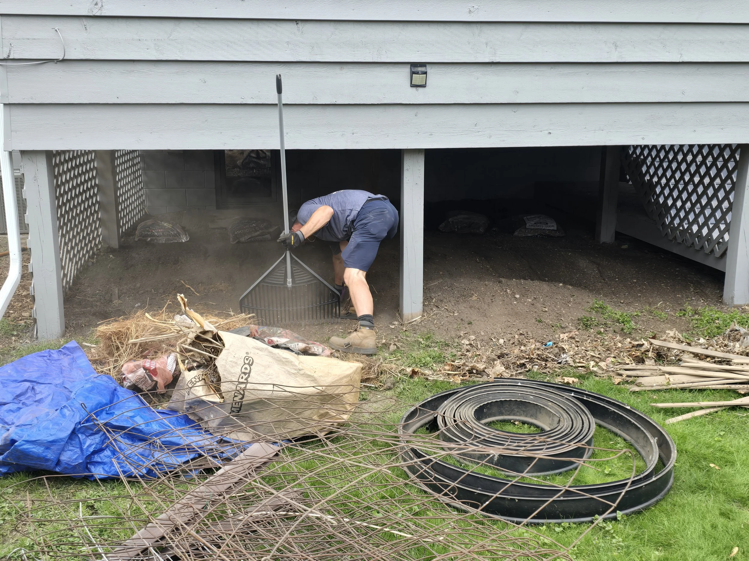 Cleaning out under the addition so we can properly prep and paint the block and windows (South Minneapolis).