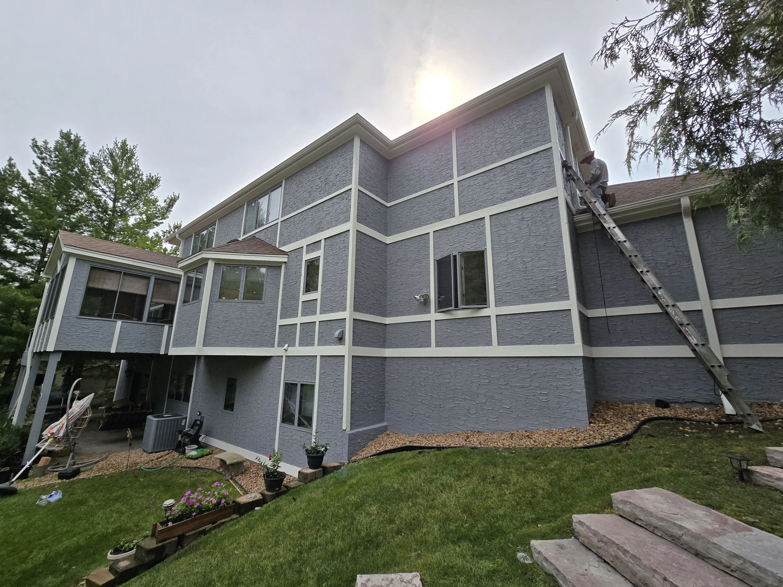 A South Edina repaint near Nine Mile Creek, refreshing this walkout home with a modern gray palette and sharp trim contrast