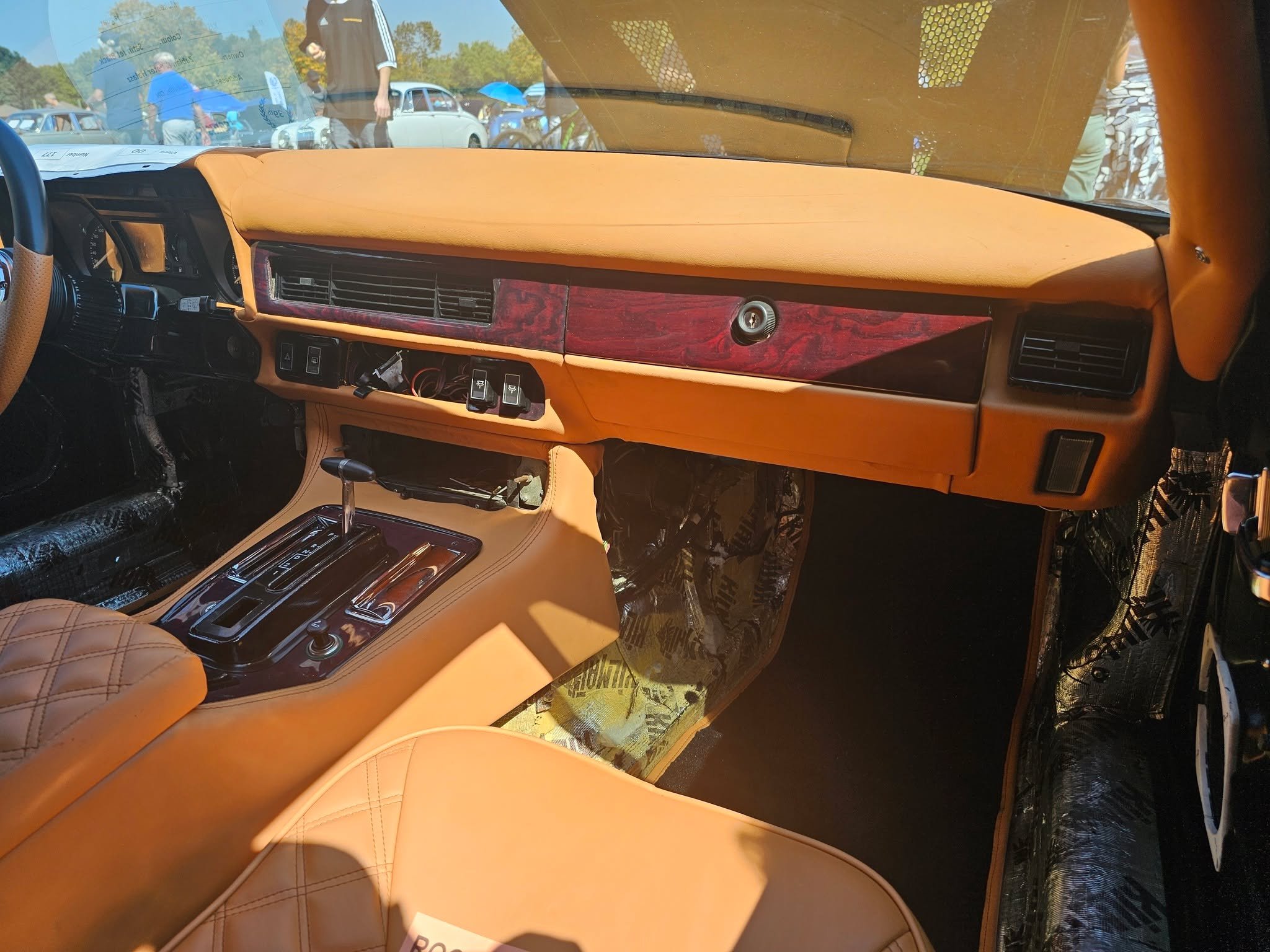 We dont just do furniture, we also do wood trim for classic and exotic cars. Over the years, we've done everything from Jags to Triumphs and Ferraris. For this Jag, we re-veneered the centre console, dashboard, A/C and door trim in a mappa burl venee