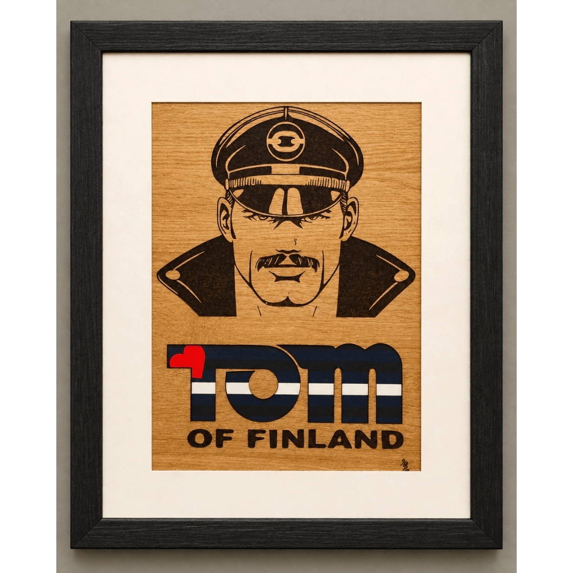 tom of finland leather flag head framed.png