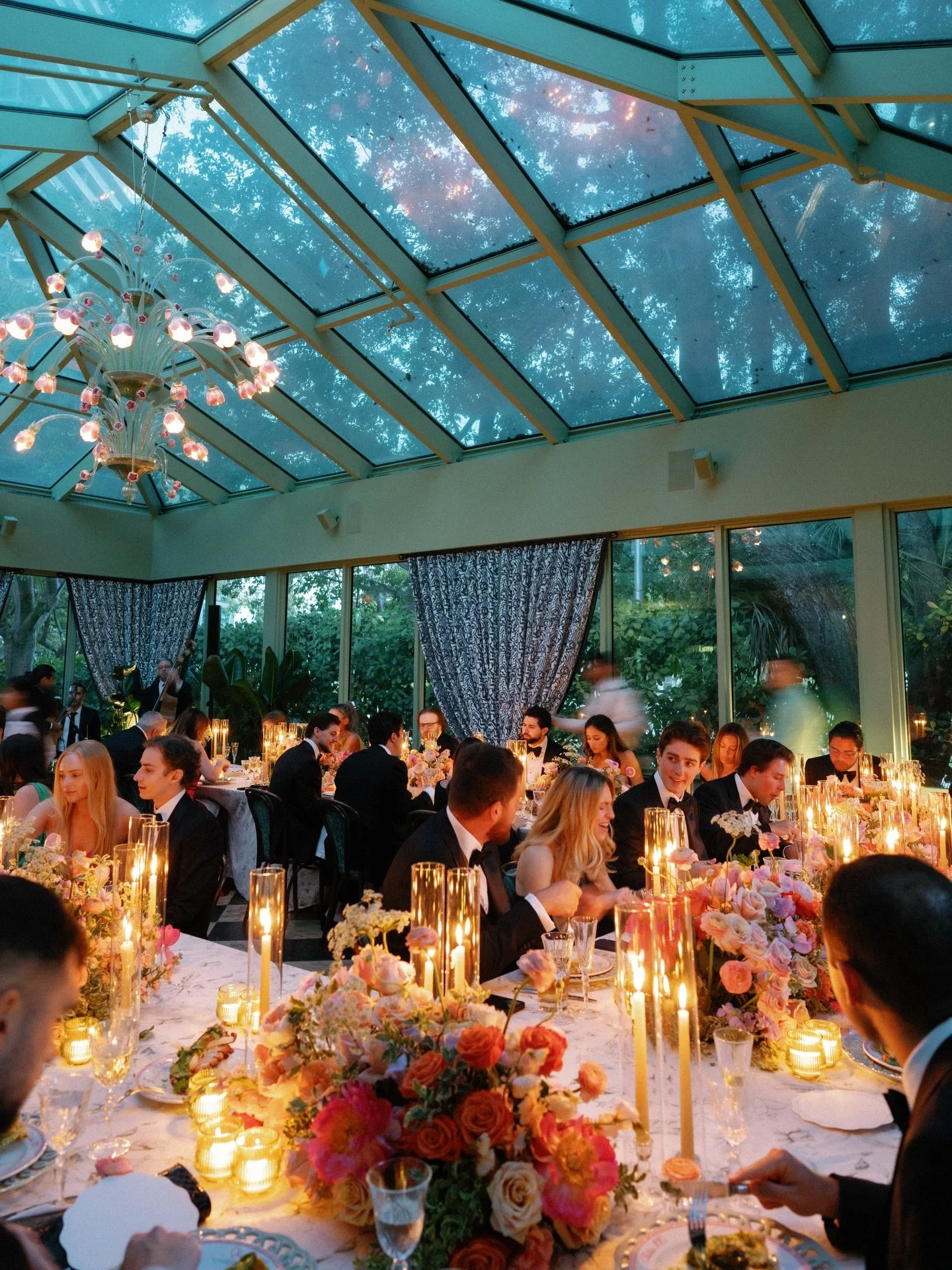 The atmosphere did most of the talking&mdash;candlelight flickering across florals, music moving quietly through the room, every table holding its own rhythm.

A space built on feeling rather than spectacle&mdash;intimate, layered, alive.

The guests