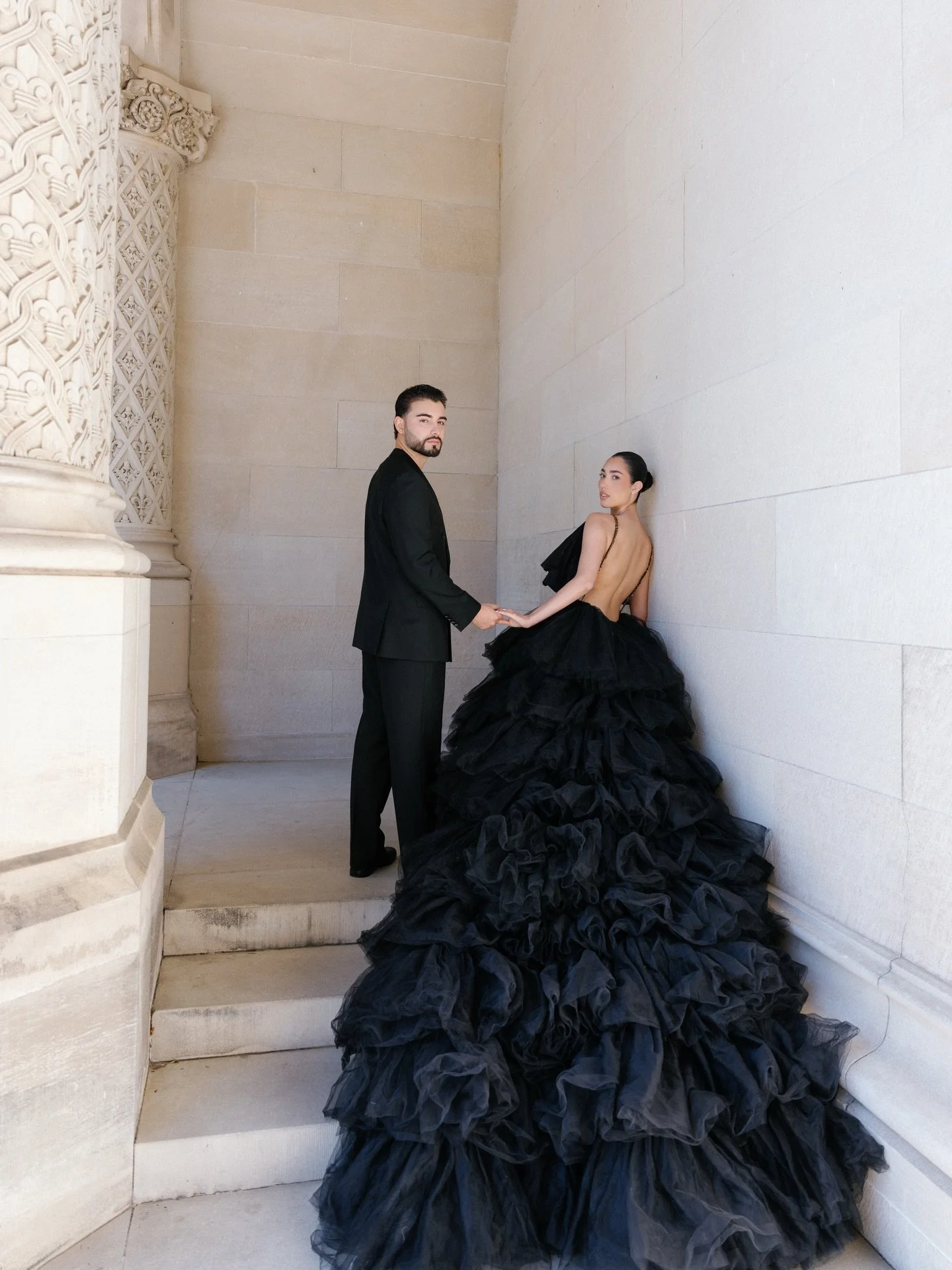 A fresh, bright morning set the tone for our arrival at the @biltmoreestate in North Carolina.
An iconic beginning to Jill and Ishmael&rsquo;s engagement session.
Jill in @millia.london, framed by the estate&rsquo;s architecture. The opening of a ser