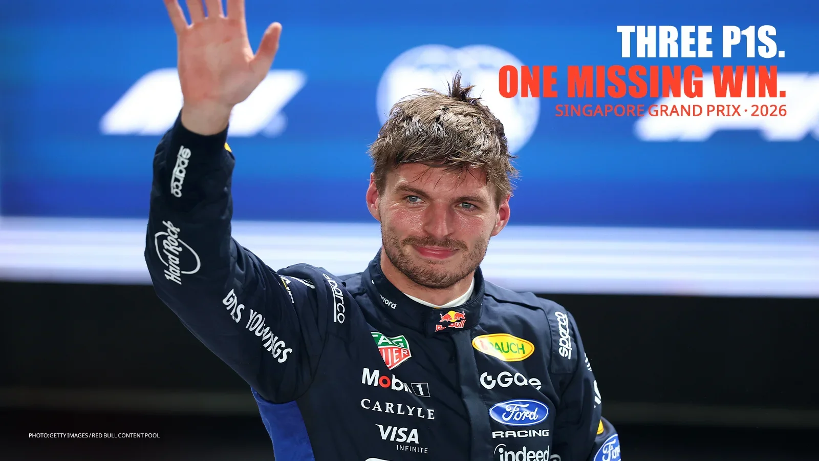 Max Verstappen waves in parc fermé after taking his first Singapore Grand Prix pole on October 10, 2026.