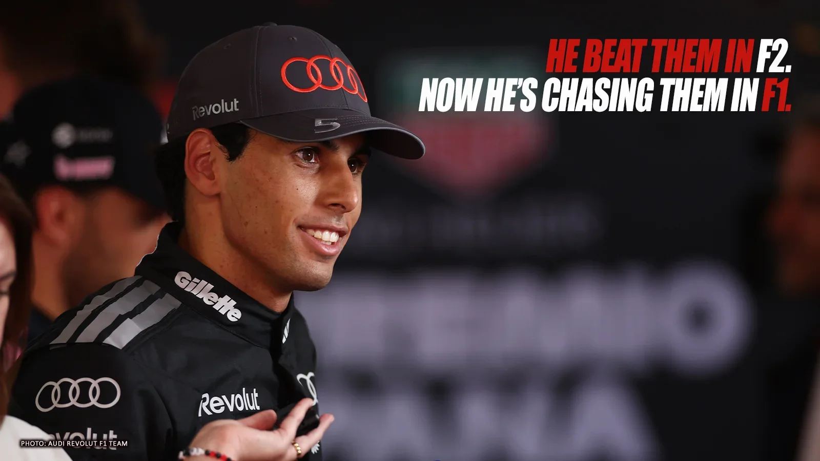 Gabriel Bortoleto wearing Audi team clothing beside the headline “He beat them in F2. Now he’s chasing them in F1.”