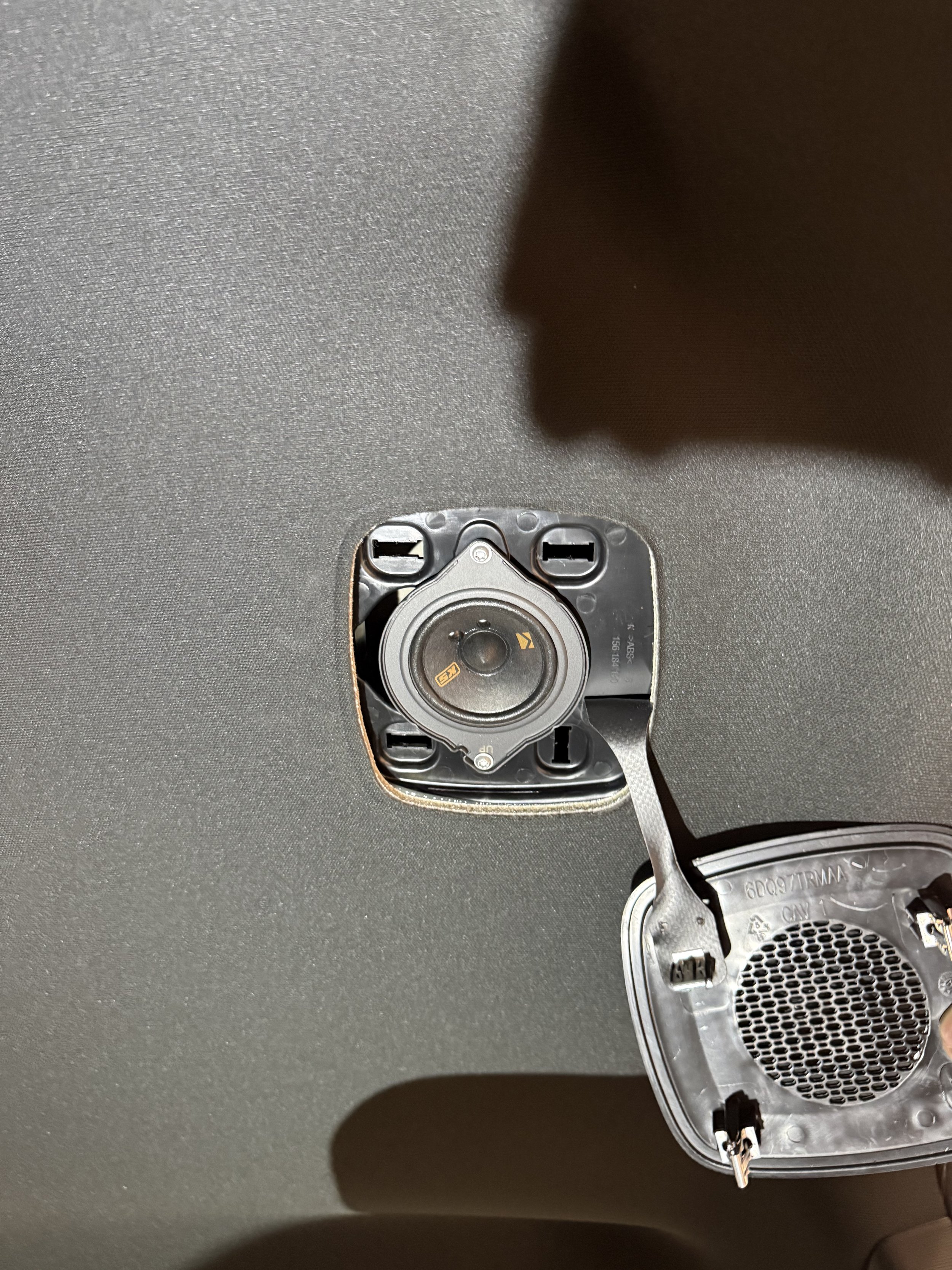 2¾-inch midrange speaker installed in a factory rear headliner location in the RAM 2500