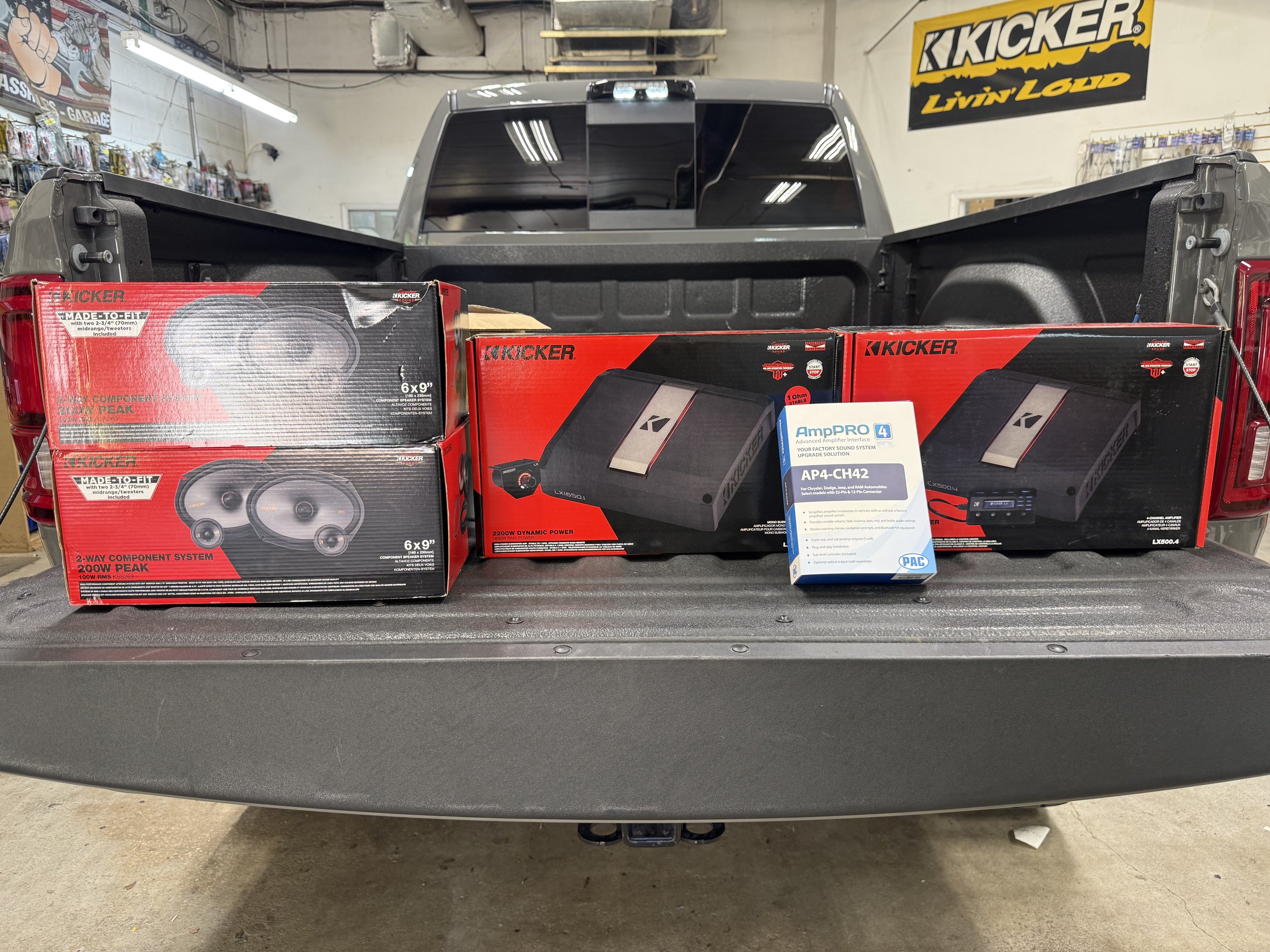 KICKER speakers and amplifiers with PAC AmpPRO interface for the RAM 2500 audio build