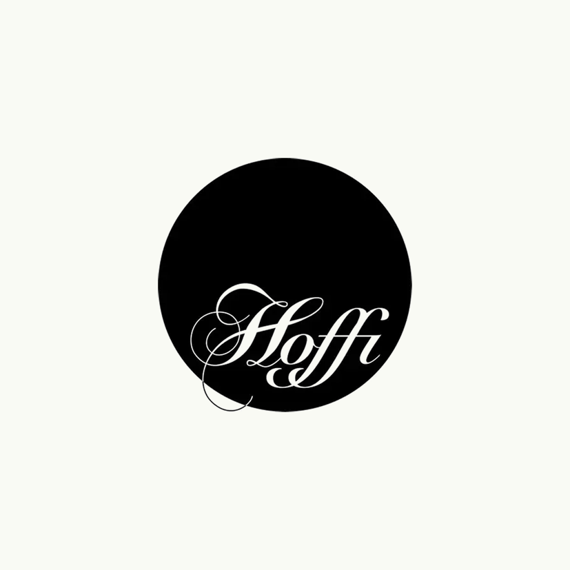 Black circle with the word 'Hoffi' in white script font.