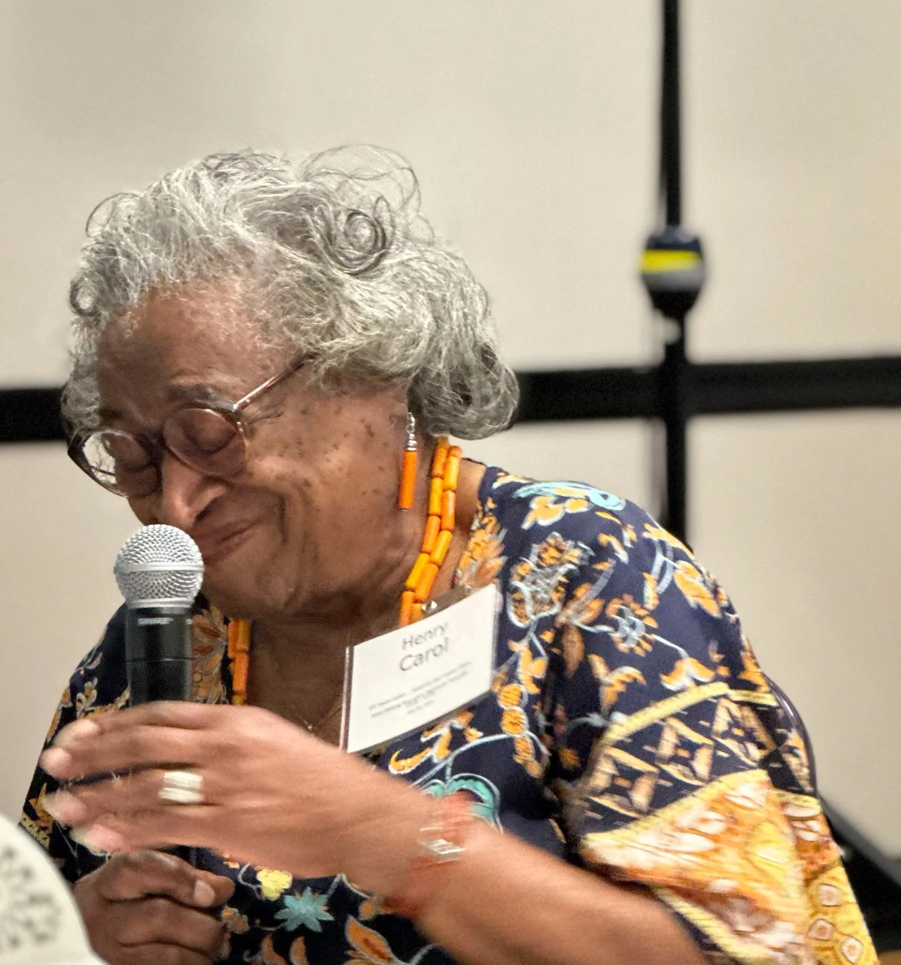 Former instructor Carol P. Henry enjoys a laugh at the 38th reunion in 2025.