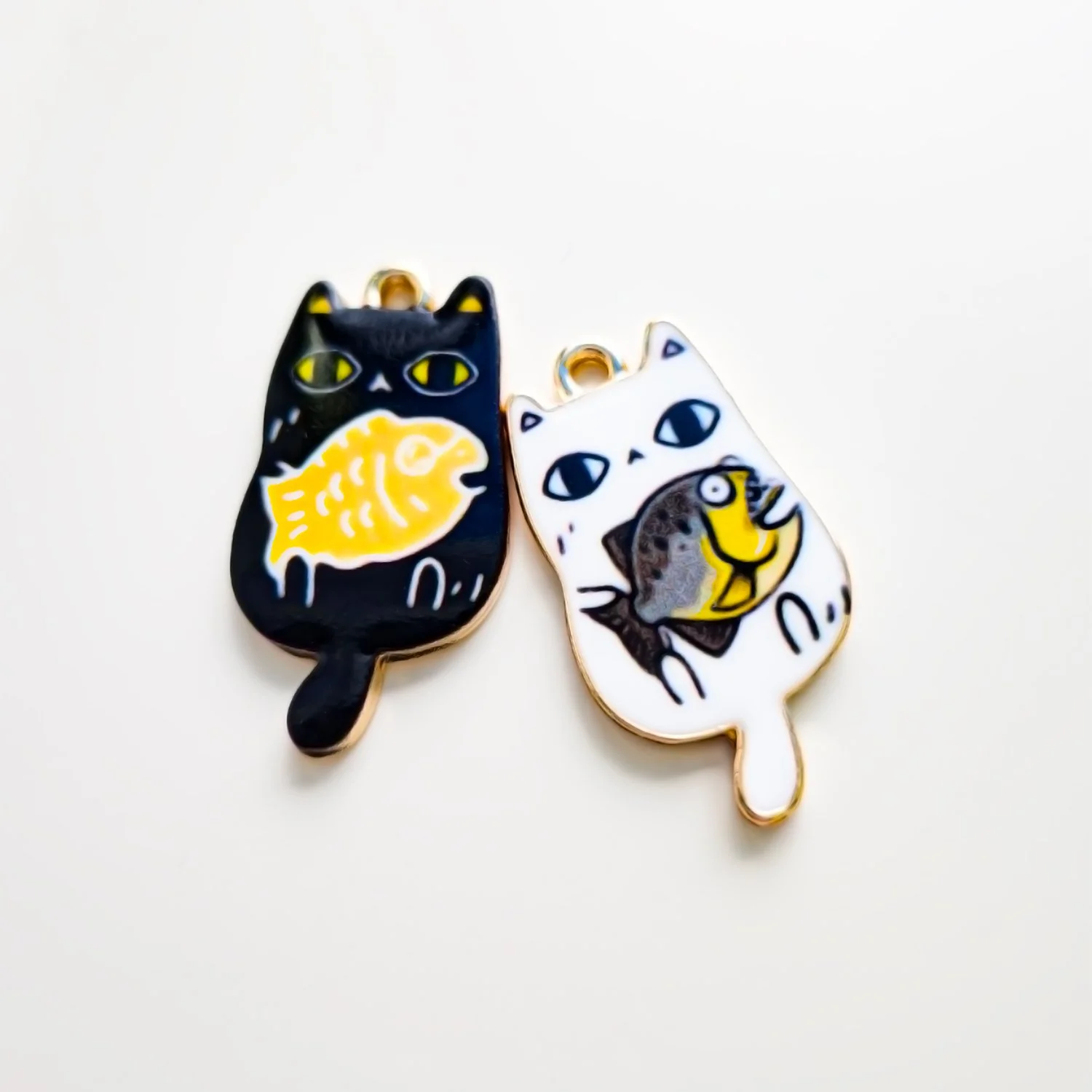 Cat Holding Fish Pendant