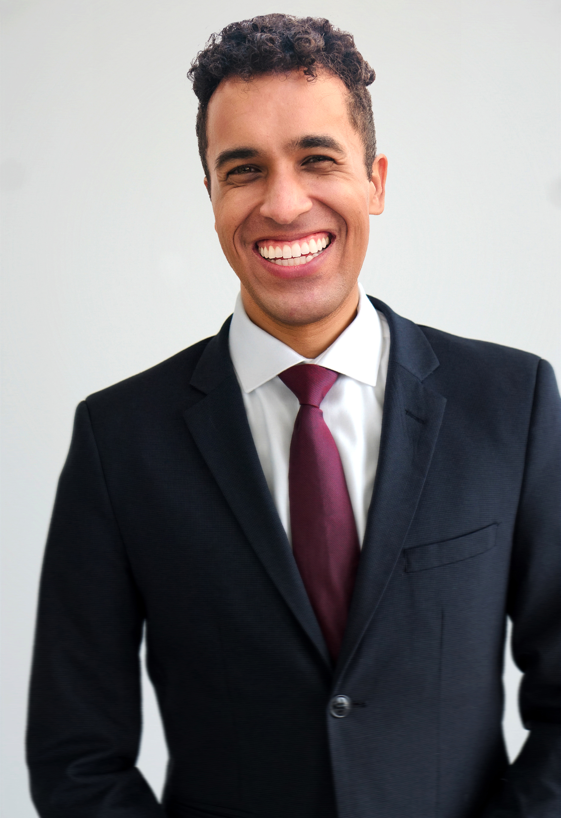 Man in a suit smiling