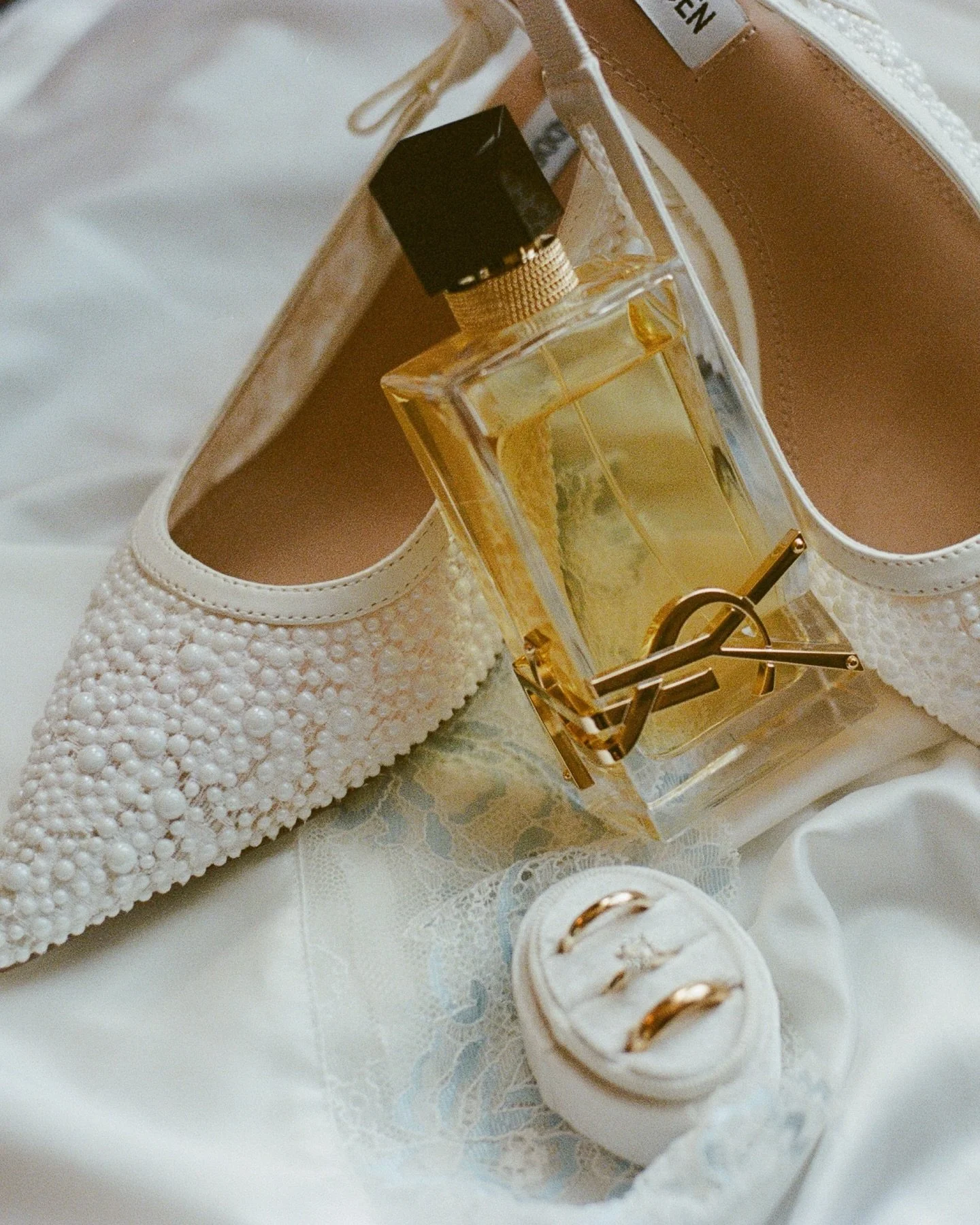 Every bit of Owen and Reese&rsquo;s day felt so intentional and well crafted. She wore a mix of new jewelry and family pieces; embroidered handkerchiefs gifted to her parents and in-laws. Her mother had a mini versions of the perfume Reese was wearin