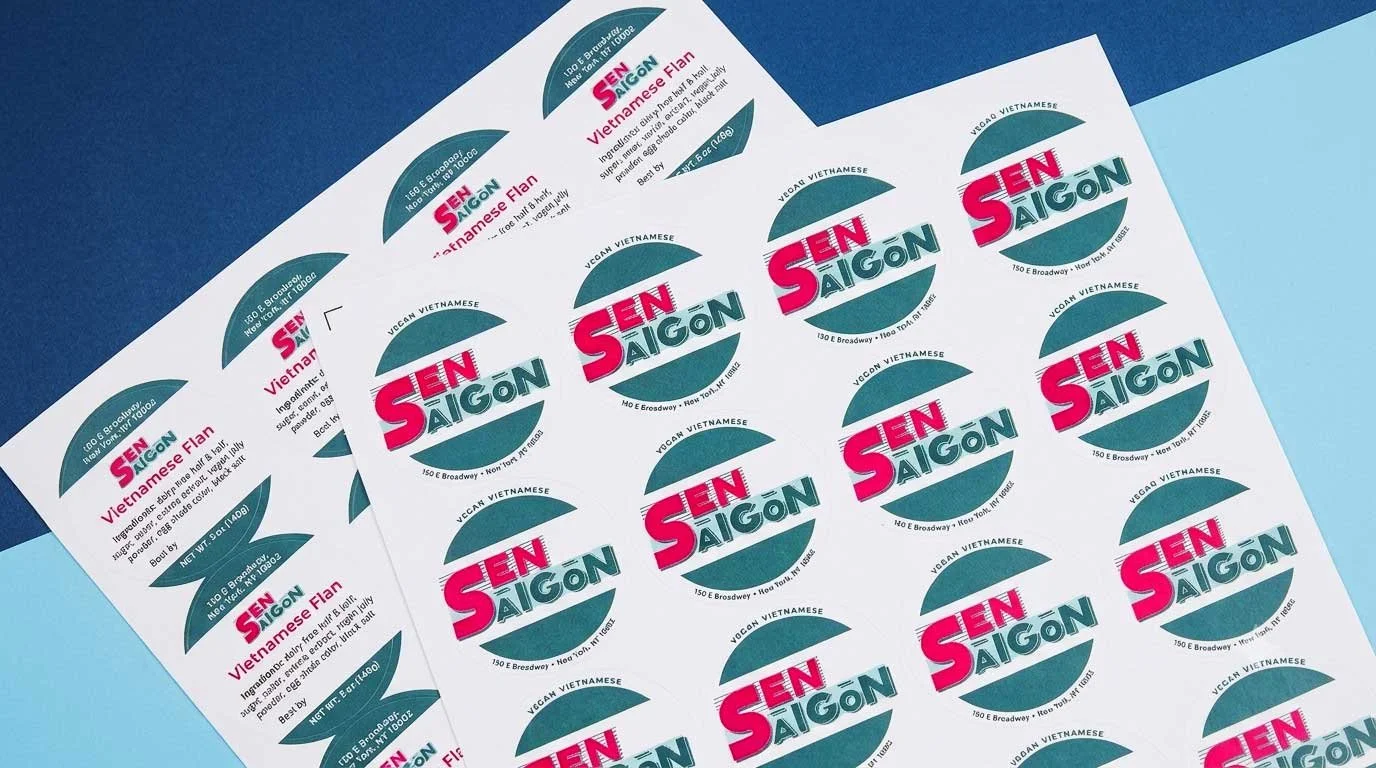 Vibrant custom label sheets for Sen Saigon, a Vietnamese small business, showcasing professional product branding.