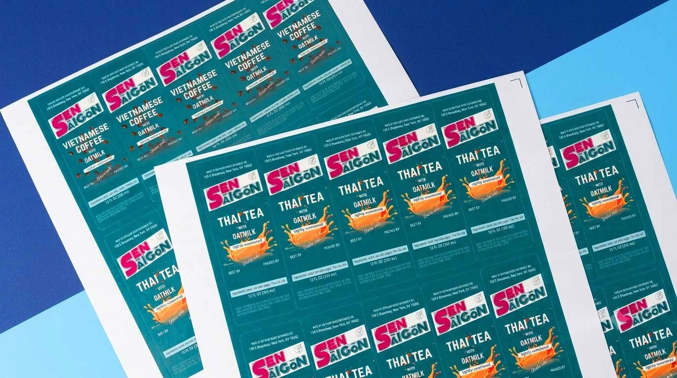 Professional custom label sheets for Sen Saigon, a small business, featuring vibrant Thai tea and Vietnamese coffee designs.