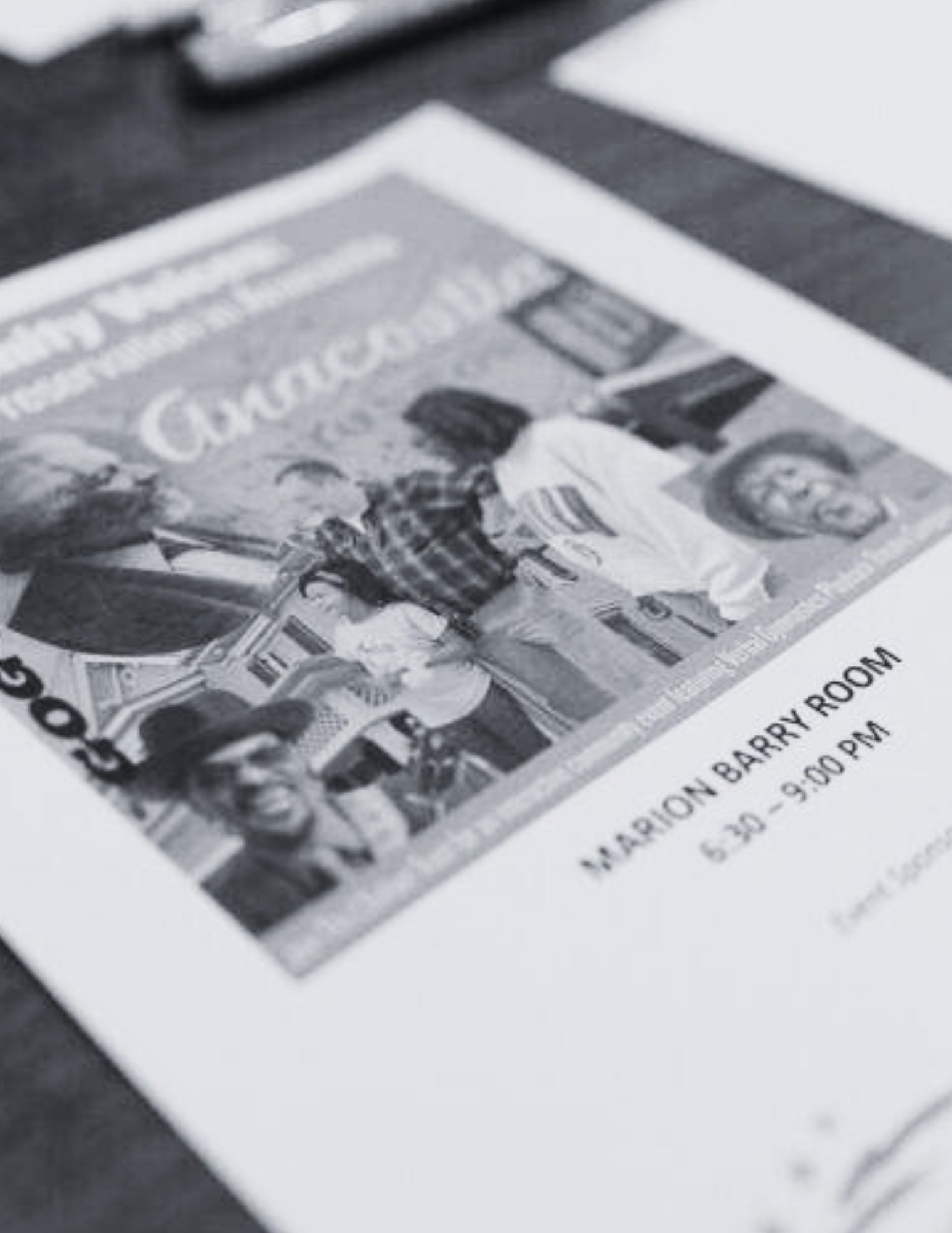 A flyer for a community event at Marion Barry Room, with a black and white photo of people socializing.