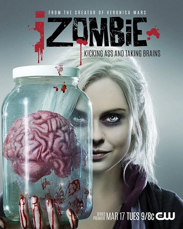 Poster for the TV series 'iZombie' featuring a woman with pale skin, platinum blonde hair, and dark makeup holding a jar with a brain inside, with the show's title and tagline 'Kicking Ass and Taking Brains'.