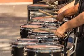 The Drumbeat of the Crowd