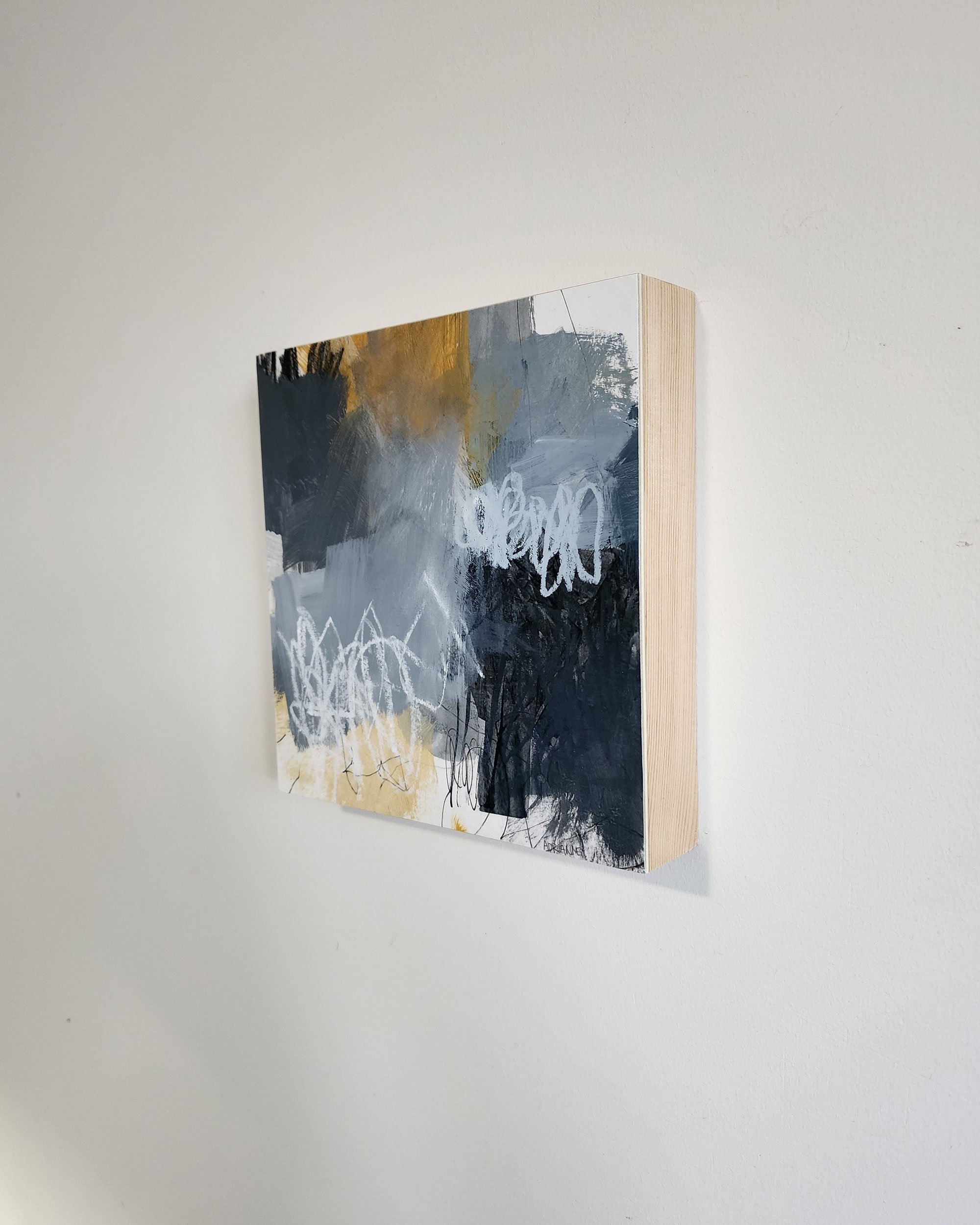 Side detail of Held In Plain Sight, abstract mixed media artwork by Adrianne Johnson, acrylic, pastel, graphite on paper mounted on wood, 8x8 inches.