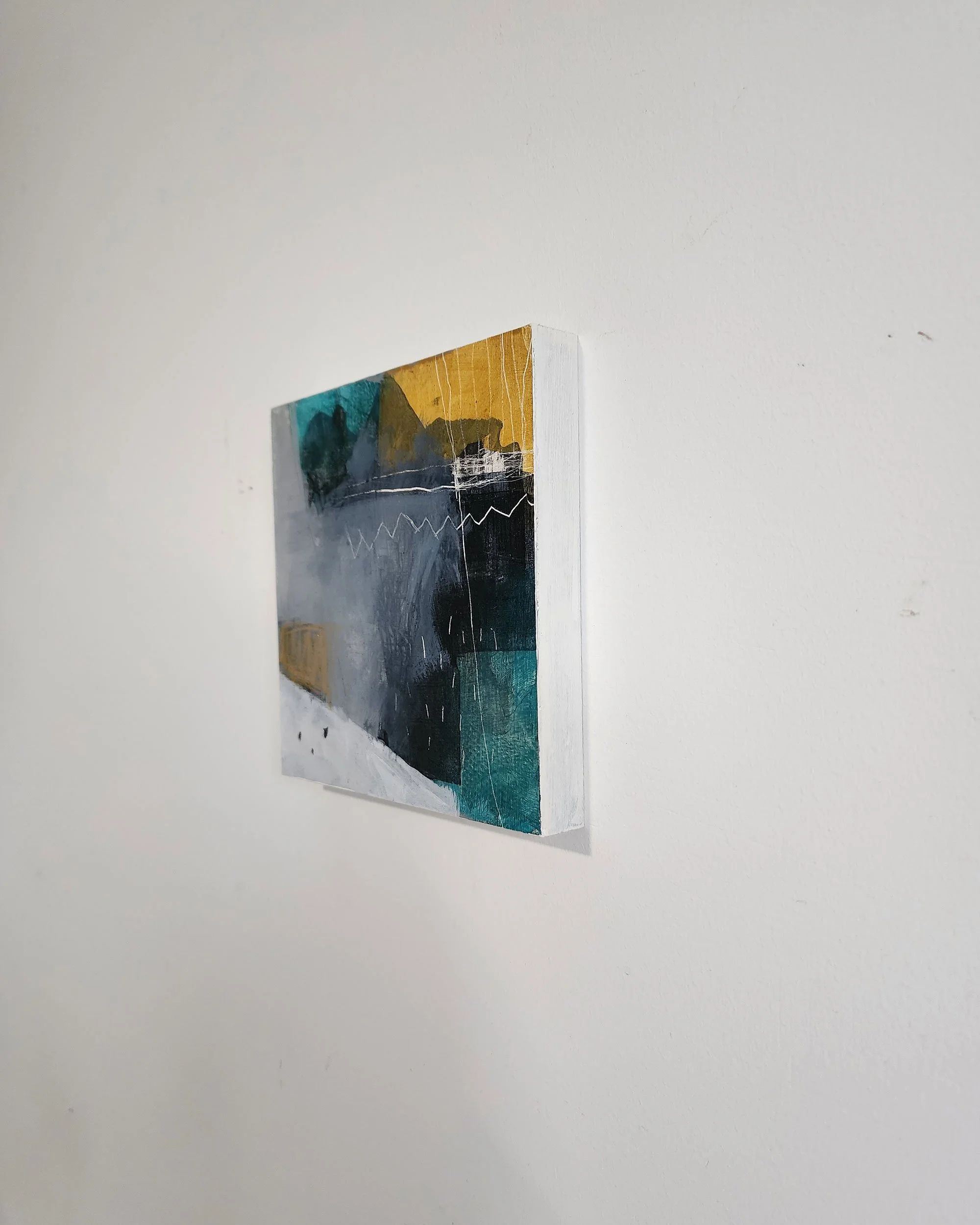 Side detail of Crossing Point abstract mixed media painting on wood by Adrianne Johnson