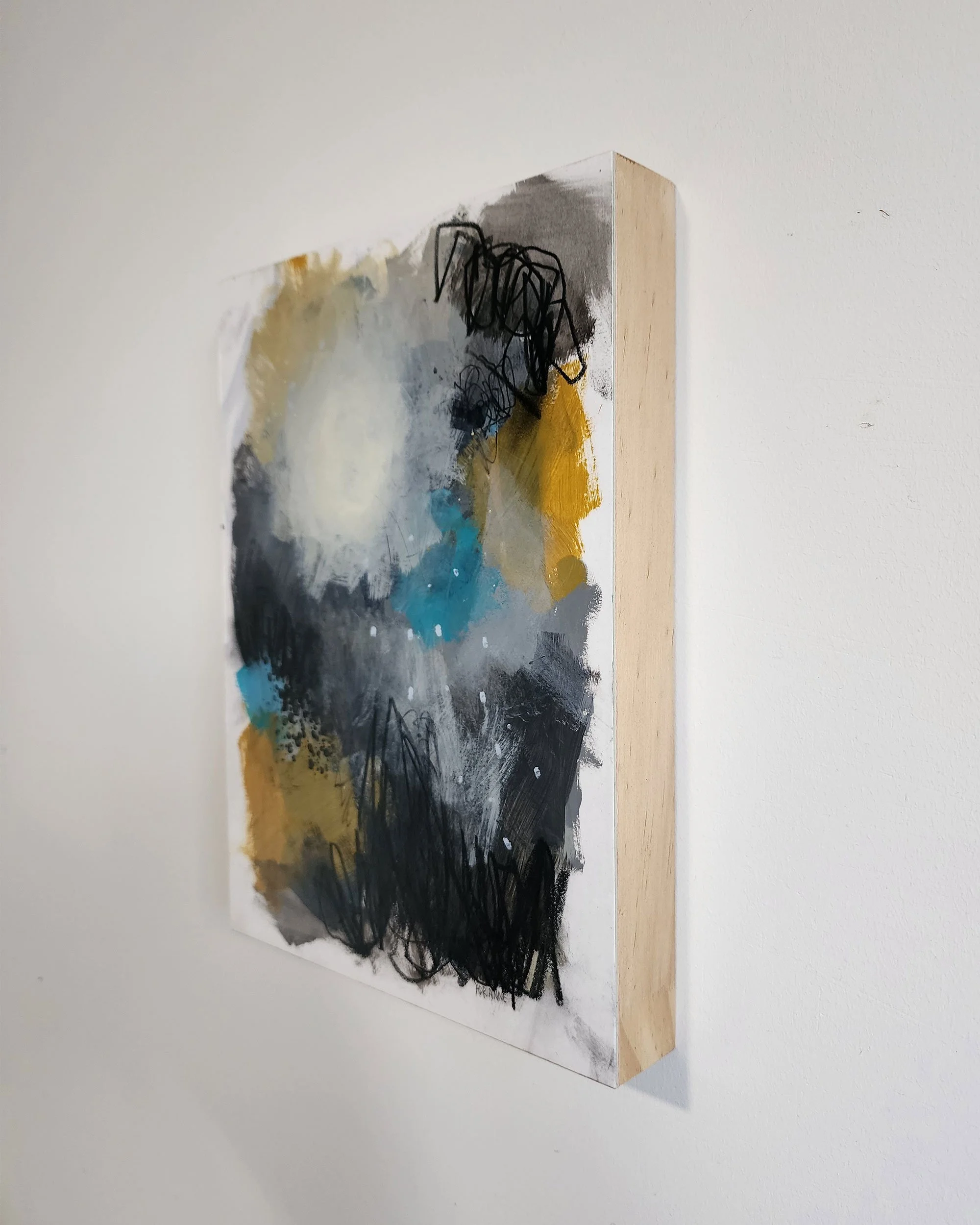 Side detail of layered mixed media textures in The Light Doesn’t Ask