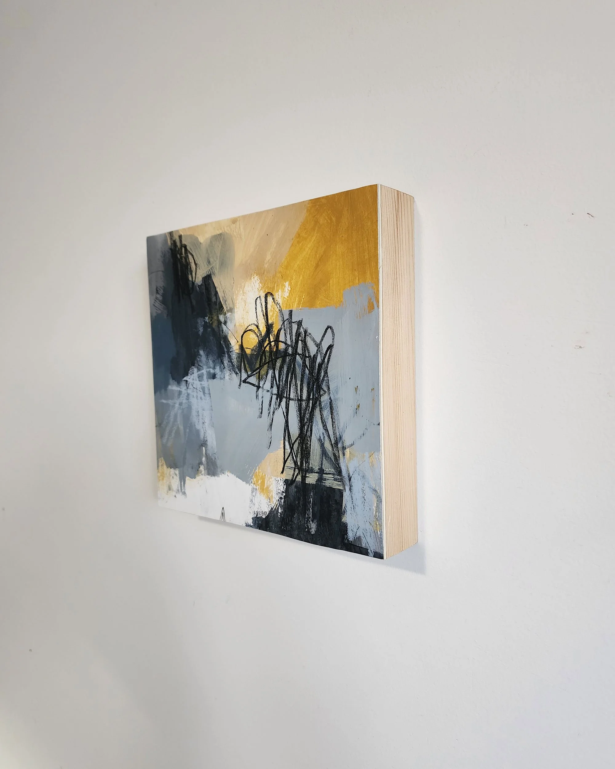 Side detail of What Remains abstract mixed media painting on wood