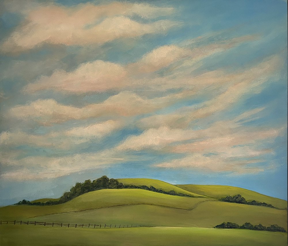 This cheerful wall art titled Last Light, by Daylesford artist Pam Gleeson, captures the rolling hills around Dean in Victoria’s Central Highlands, at sunset.