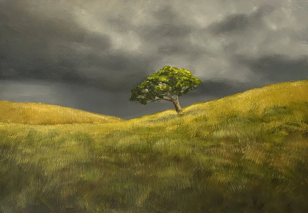 This dramatic wall art titled Solitude II, by Daylesford artist Pam Gleeson, shows a lone tree on a grassy hillside set against the backdrop of an approaching storm.