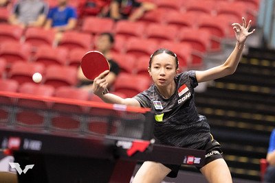 Coach Janissa competing in a table tennis tournament
