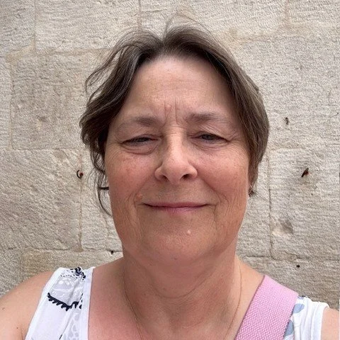 Volunteer Tracey posing for a photograph