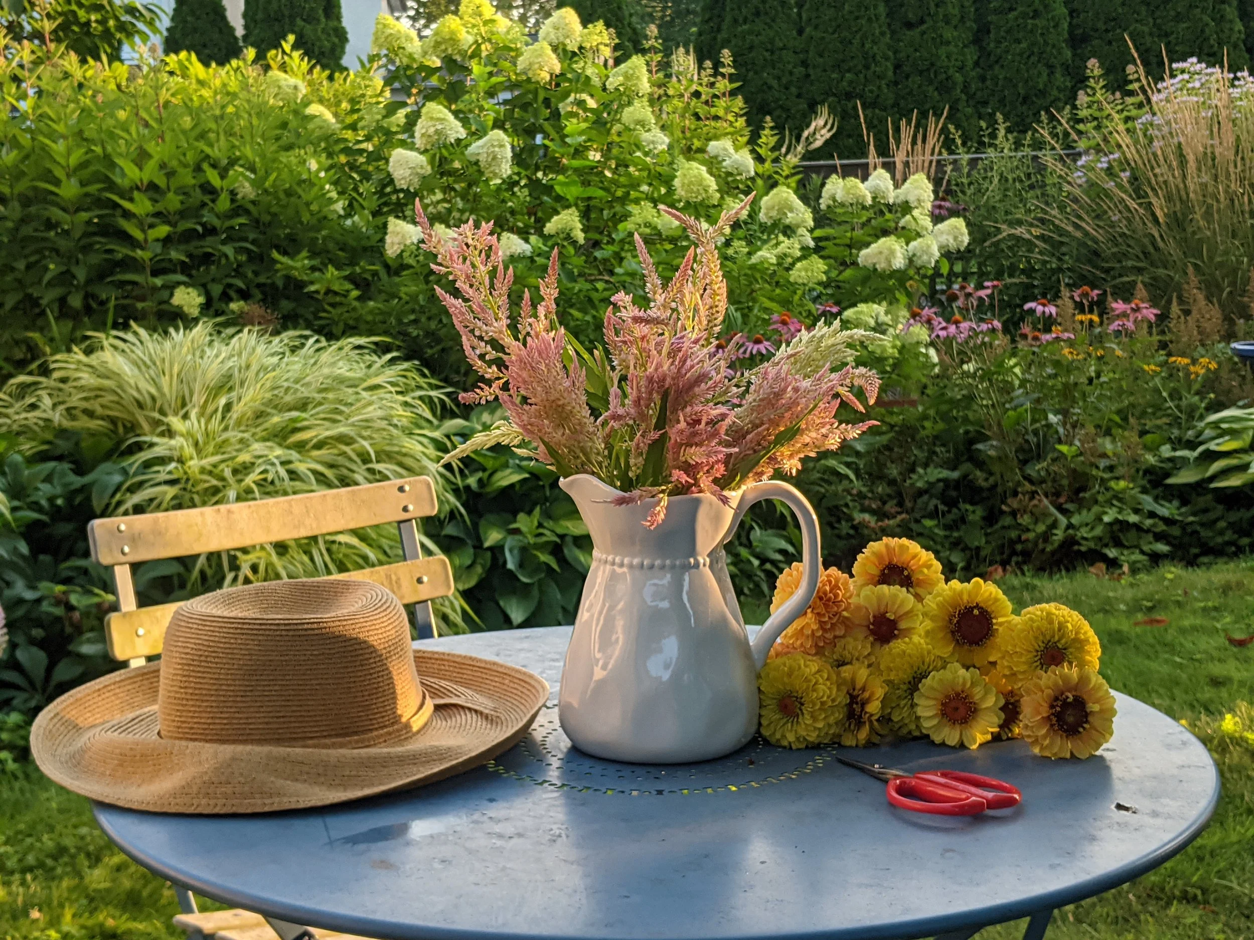 cut flowers_lifestyle shot_Celosia mix & Zinnia yellows_morning light_close copy.jpg