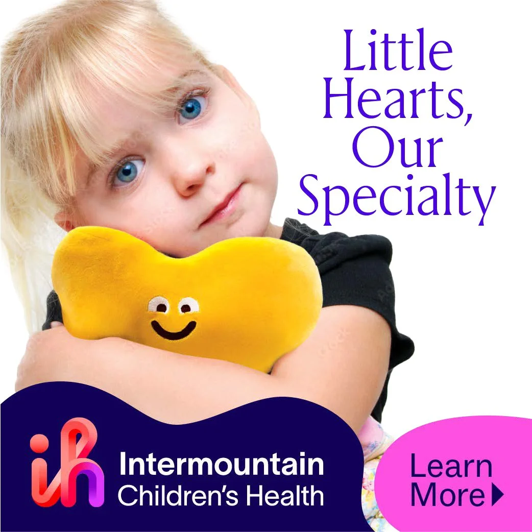 Intermountain Children's Health cardiology ad with a girl hugging a yellow heart plush and the text "Little Hearts, Our Specialty."