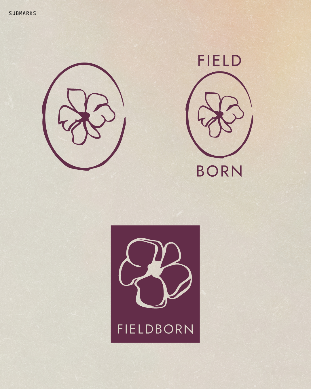 Three labels with stylized flower illustrations and text. The first label says 'SUBMARKS' and contains an oval outline with a flower inside. The second label, with the words 'FIELD BORN', has a similar design. The third label features a stylized flower diagram in a square with the text 'FIELDBORN' underneath.