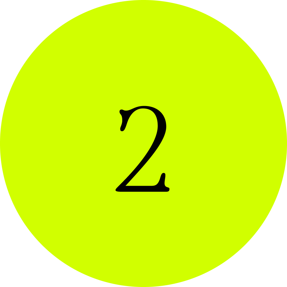A yellow circular sign with the number 2 in black in the center.