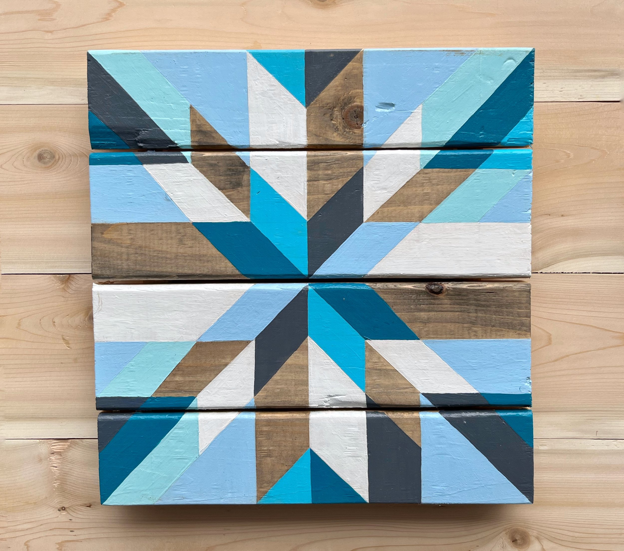SOLD
Each wall quilt is one of a kind and painted by hand here on the island.