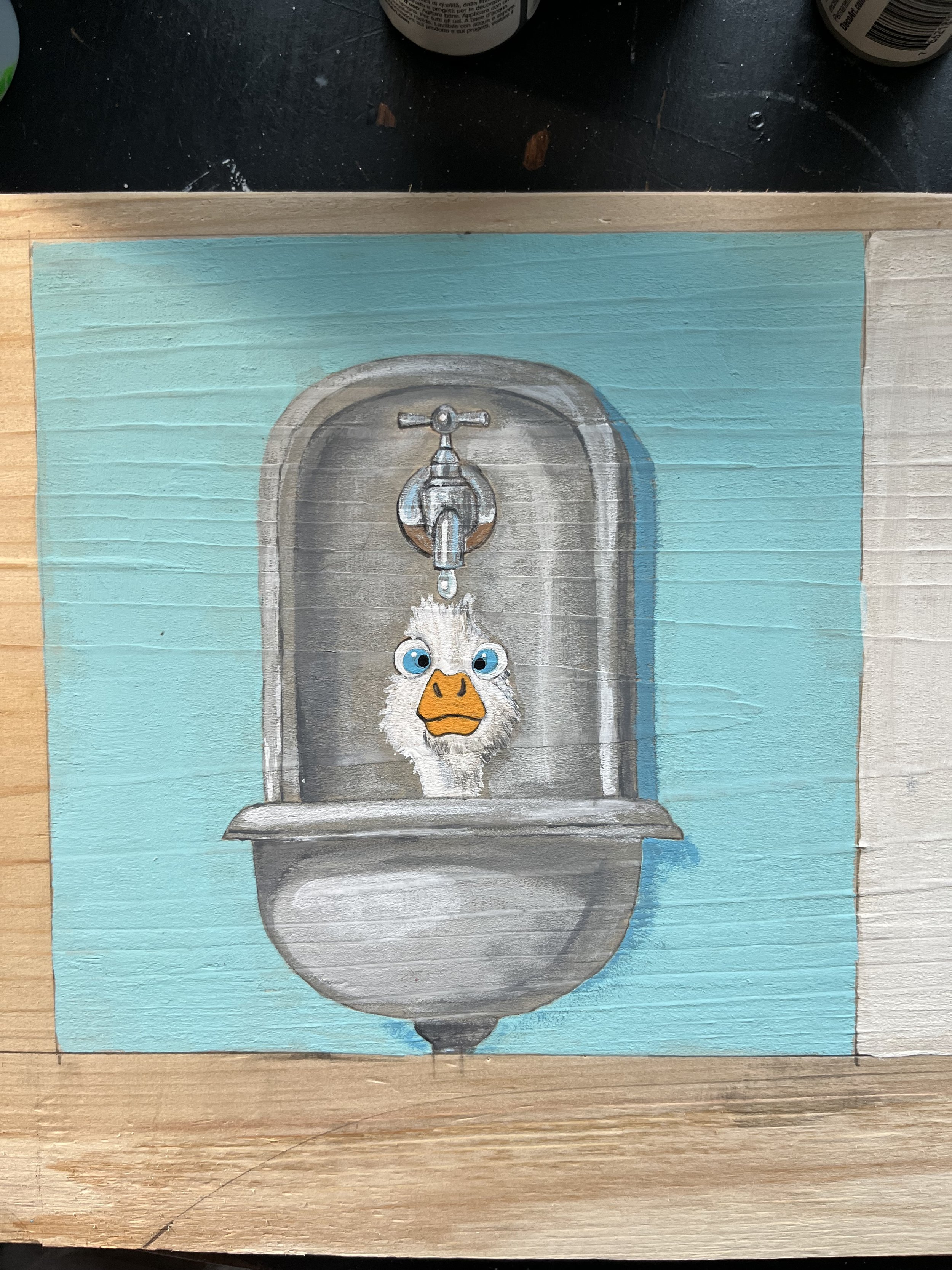 Construction ends, painted as a large statement backsplash for a client's vintage porcelain double sink.