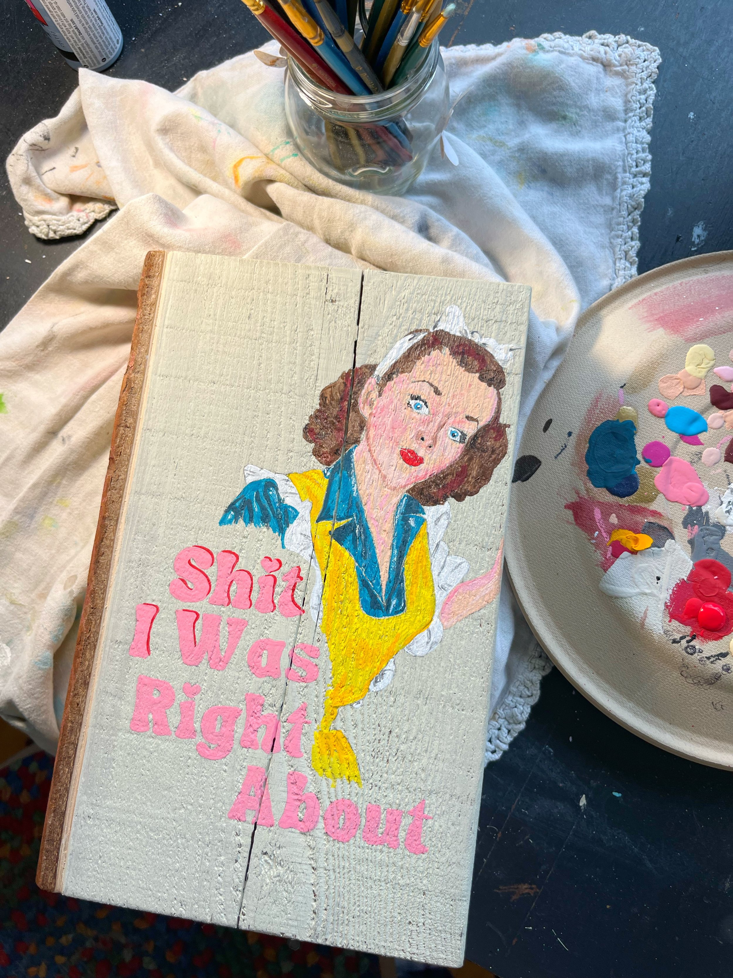 Wood block ends, carved into books and painted with sassy covers.