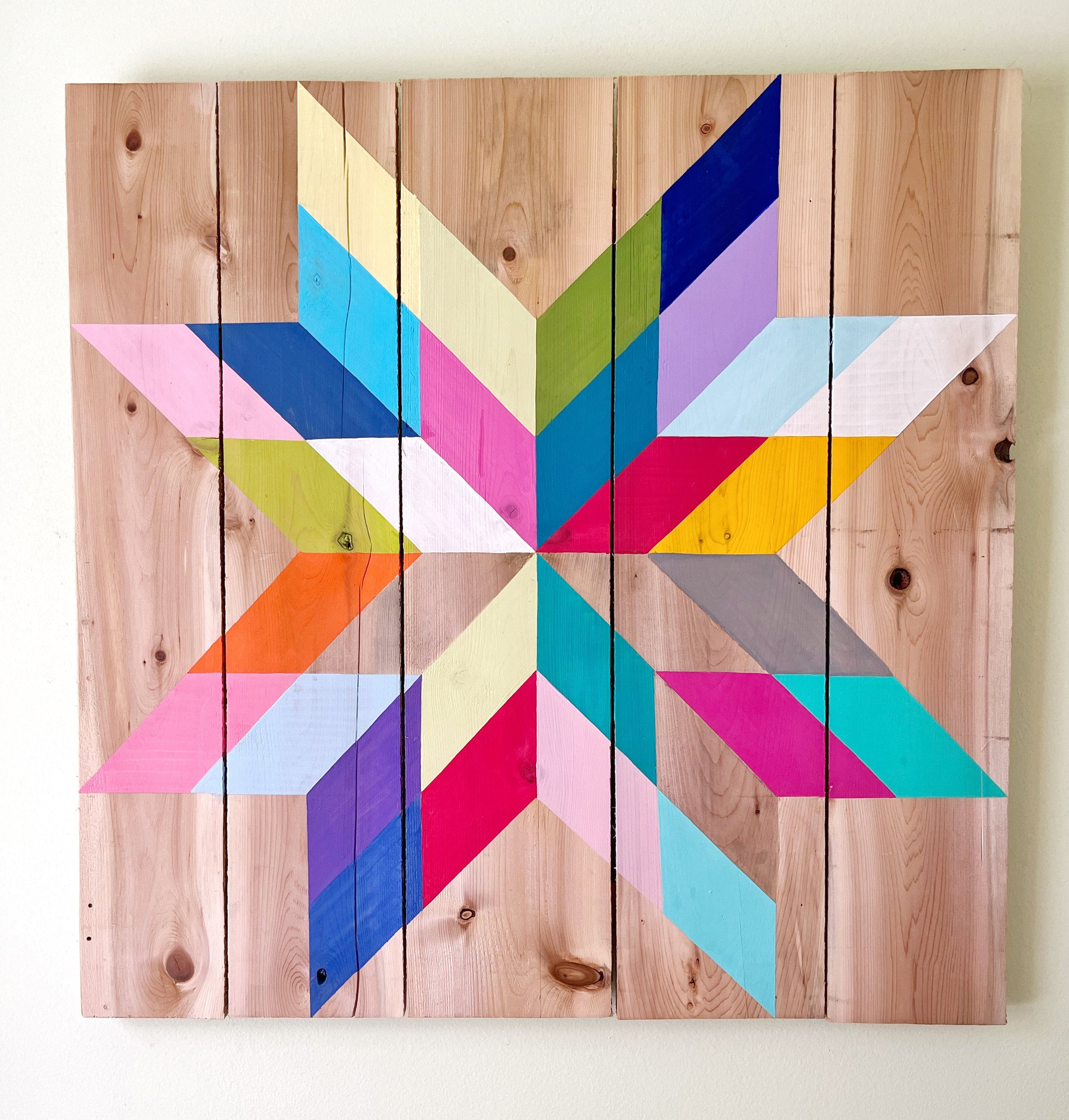 SOLD
Each wall quilt is one of a kind and painted by hand here on the island.