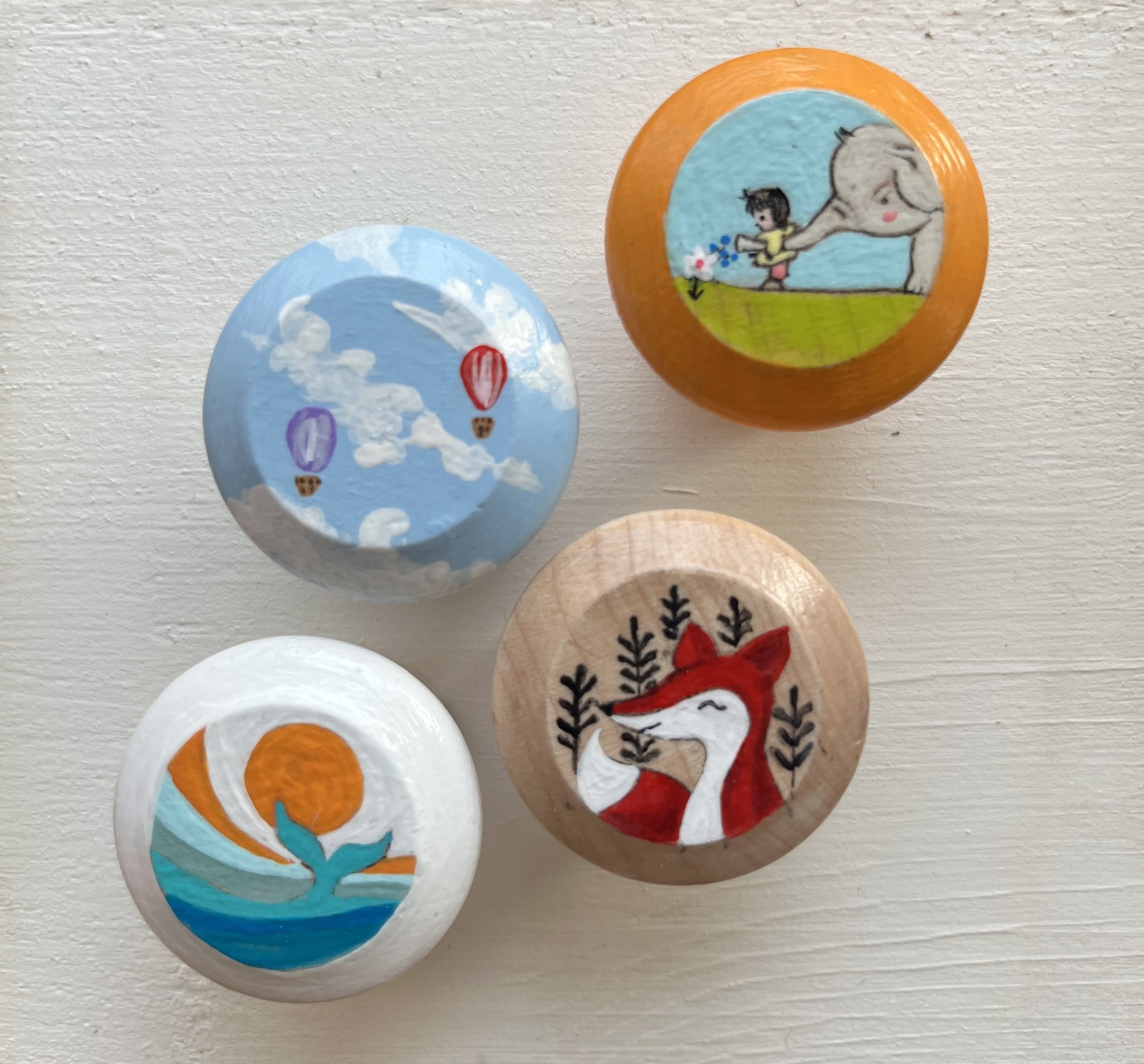 old wooden drawer and door knobs, hand painted to refresh.