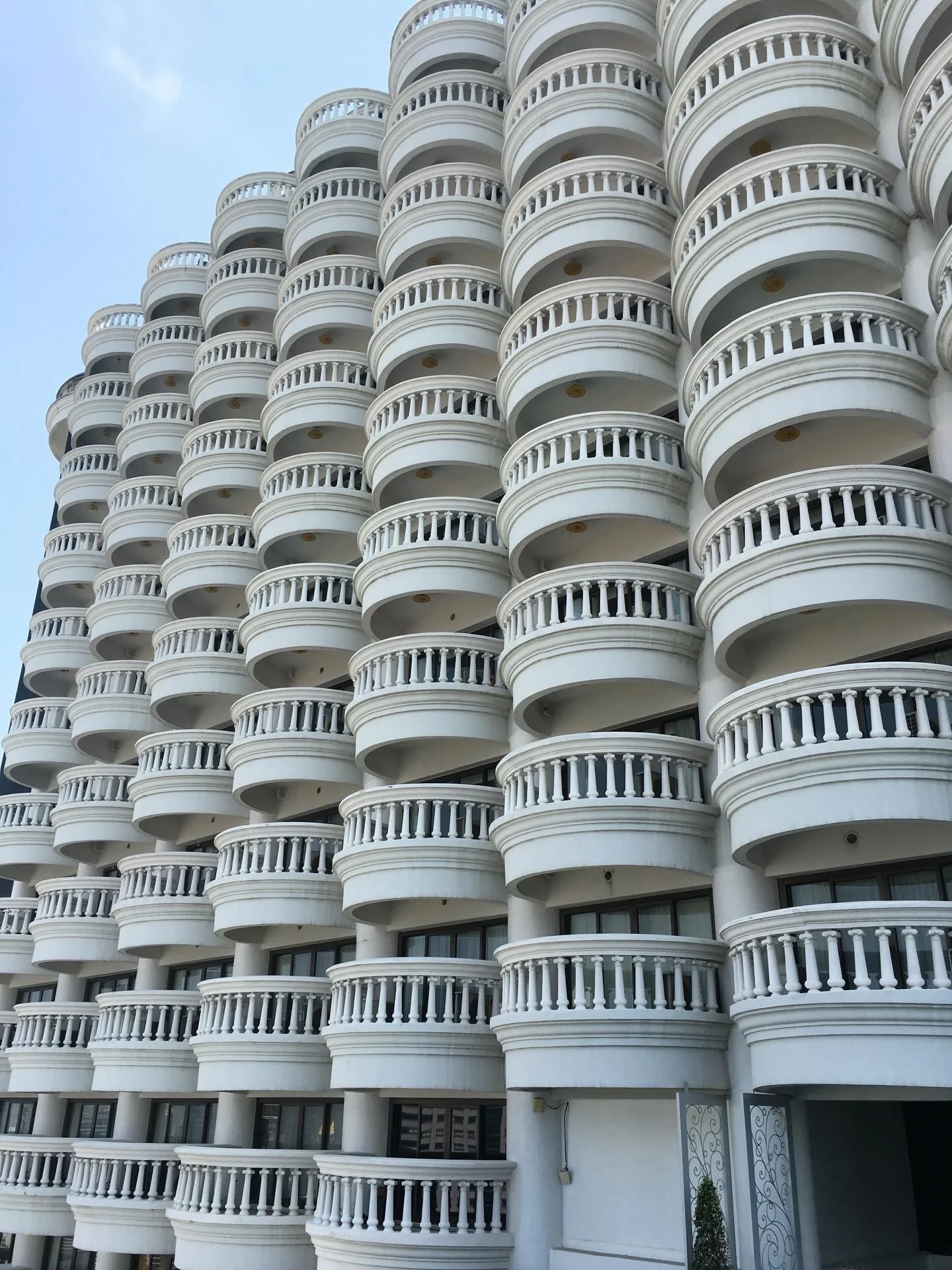 I was struck by this architectural moment during my stay at Lebua at State Tower. An icon in the heart of Bangkok, the symmetry, scale, and curved detailing turn a fa&ccedil;ade into a statement piece.

#Architecture #Bangkok #Thailand #LebuaAtStateT